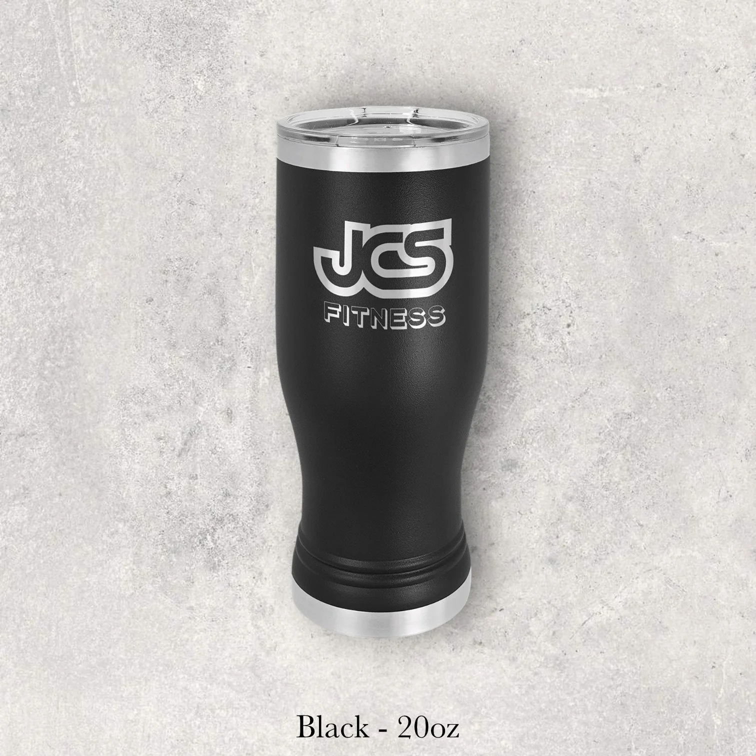 Black 20oz pilsner-style tumbler engraved by Lazeric with the JCS Fitness logo.