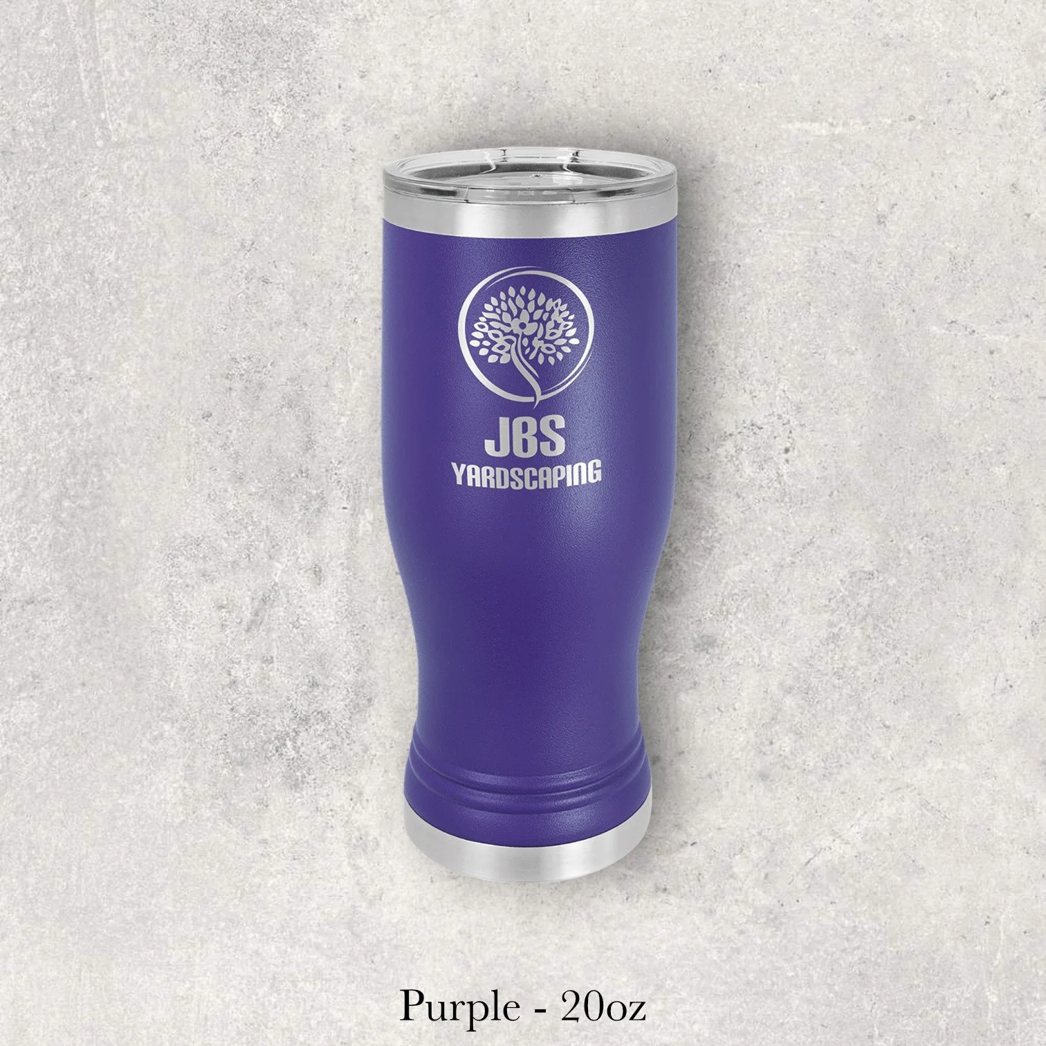 Purple 20oz pilsner-style tumbler engraved by Lazeric with the JBS Yardscaping logo.