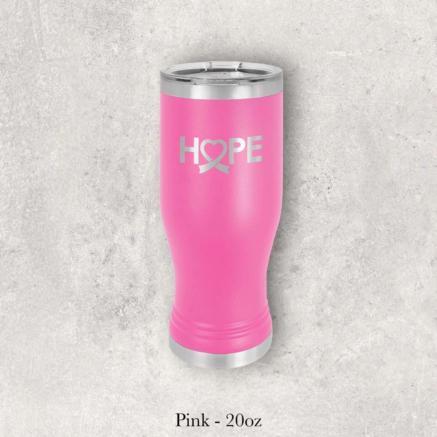 Pink 20oz pilsner-style tumbler engraved by Lazeric with a “Hope” ribbon design.