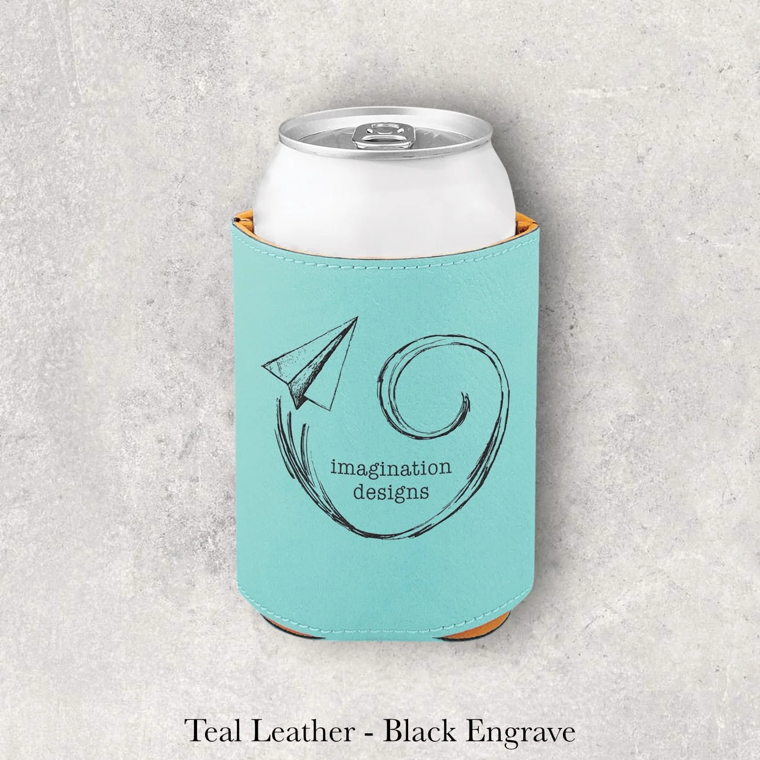 Laser engraved teal leather can coozie with Imagination Designs logo, engraved by Lazeric