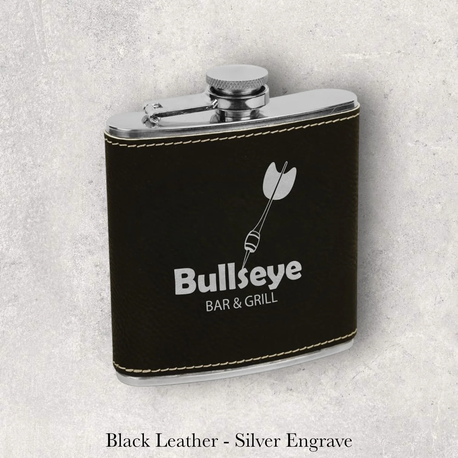 Black leather 6oz flask with Bullseye Bar & Grill logo, silver laser engraving, engraved by Lazeric