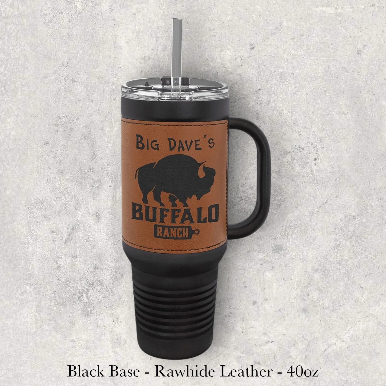 Black base rawhide leather 40oz travel mug with Big Dave’s Buffalo Ranch logo and buffalo graphic, engraved by Lazeric