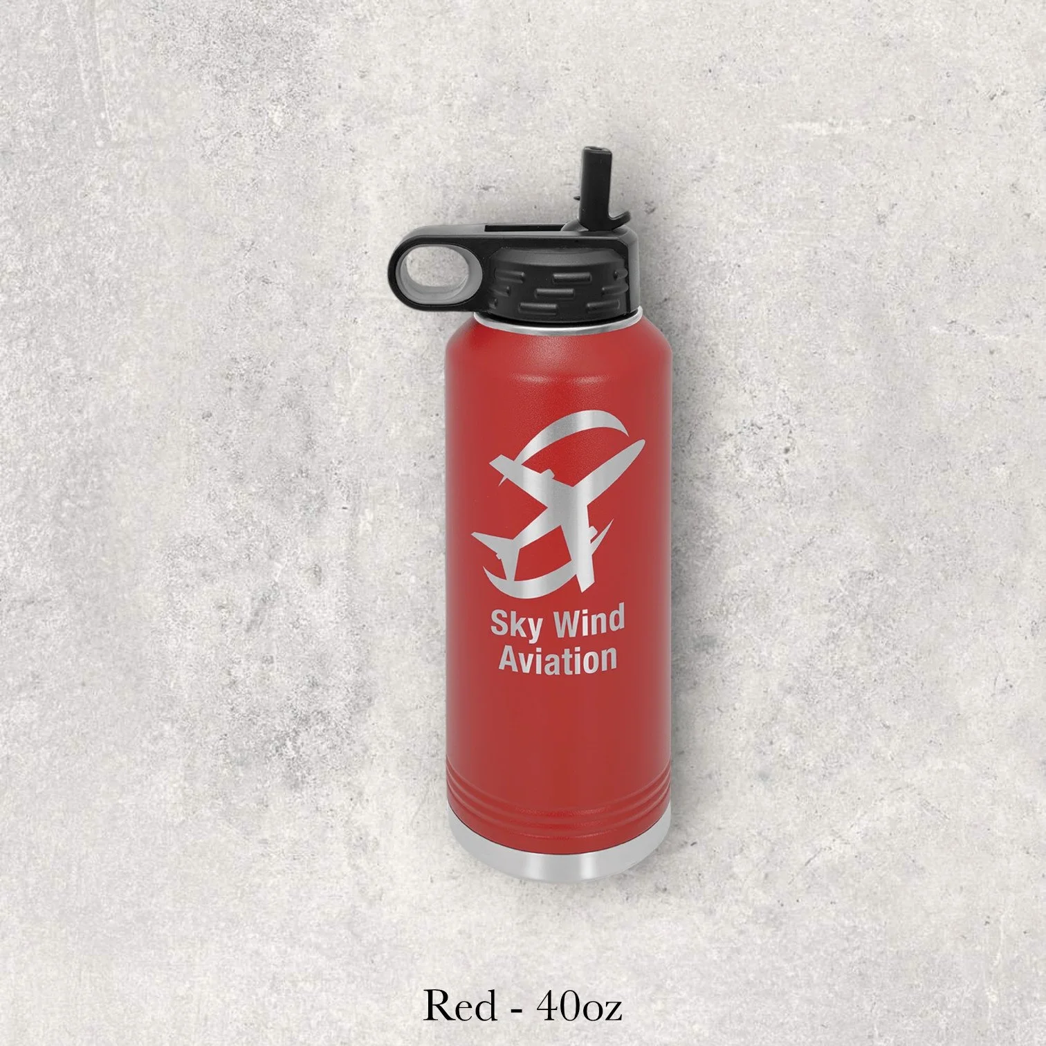 Red 40oz metal water bottle engraved by Lazeric featuring an aviation-themed logo with a stylized airplane graphic.