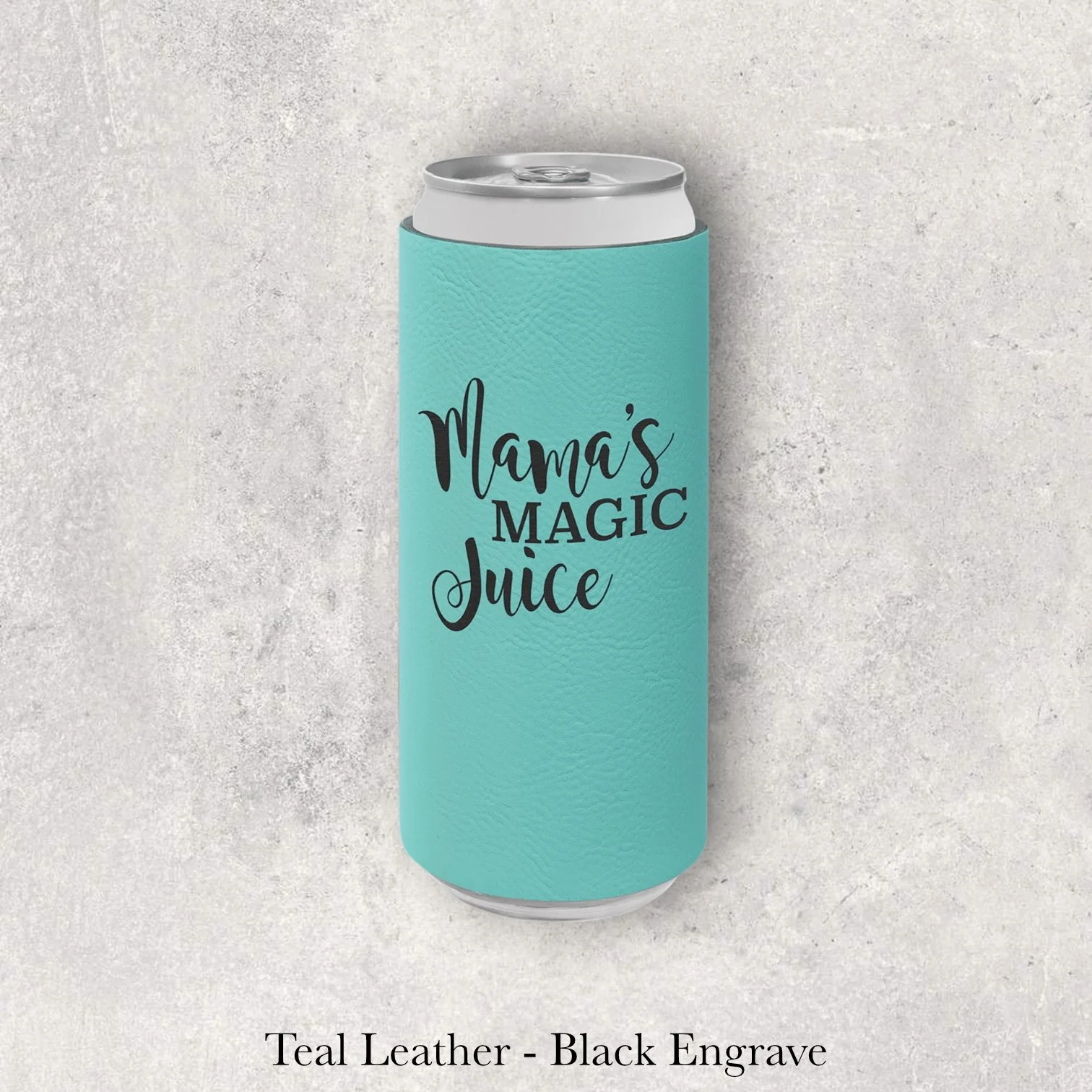 Teal leather slim can coozie with black laser-engraved “Mama’s Magic Juice” script design, engraved by Lazeric