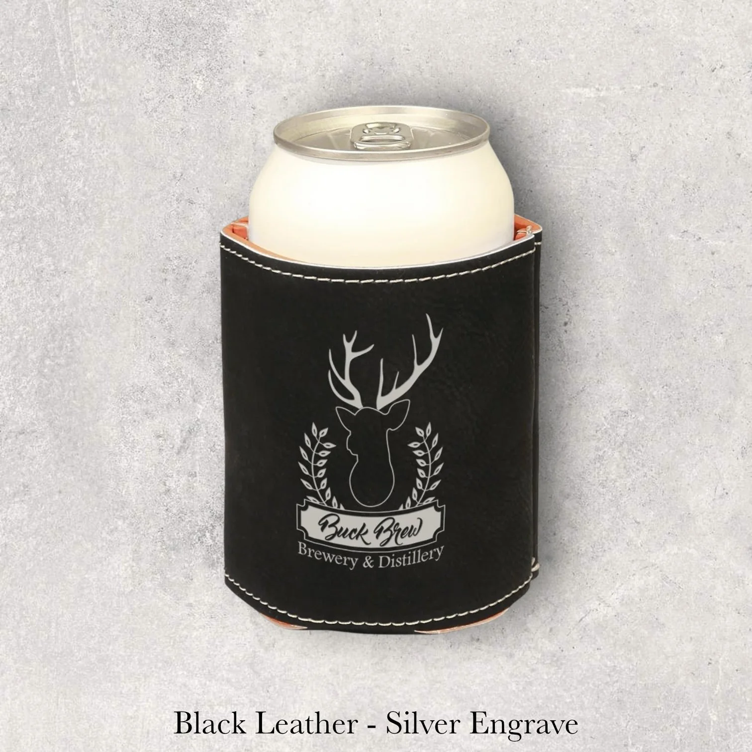 Laser engraved black leather can coozie with Frank’s Pride Brewery & Distillery deer logo, engraved by Lazeric