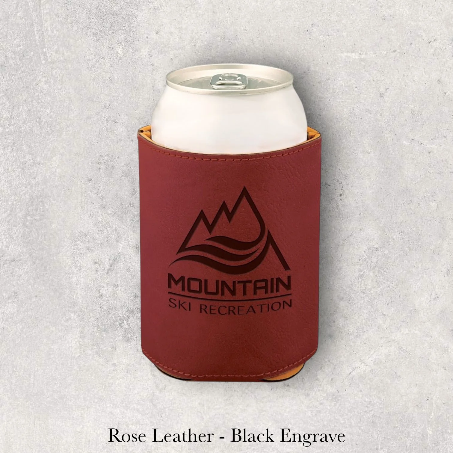 Laser engraved rose leather can coozie with Mountain Ski Recreation logo, engraved by Lazeric