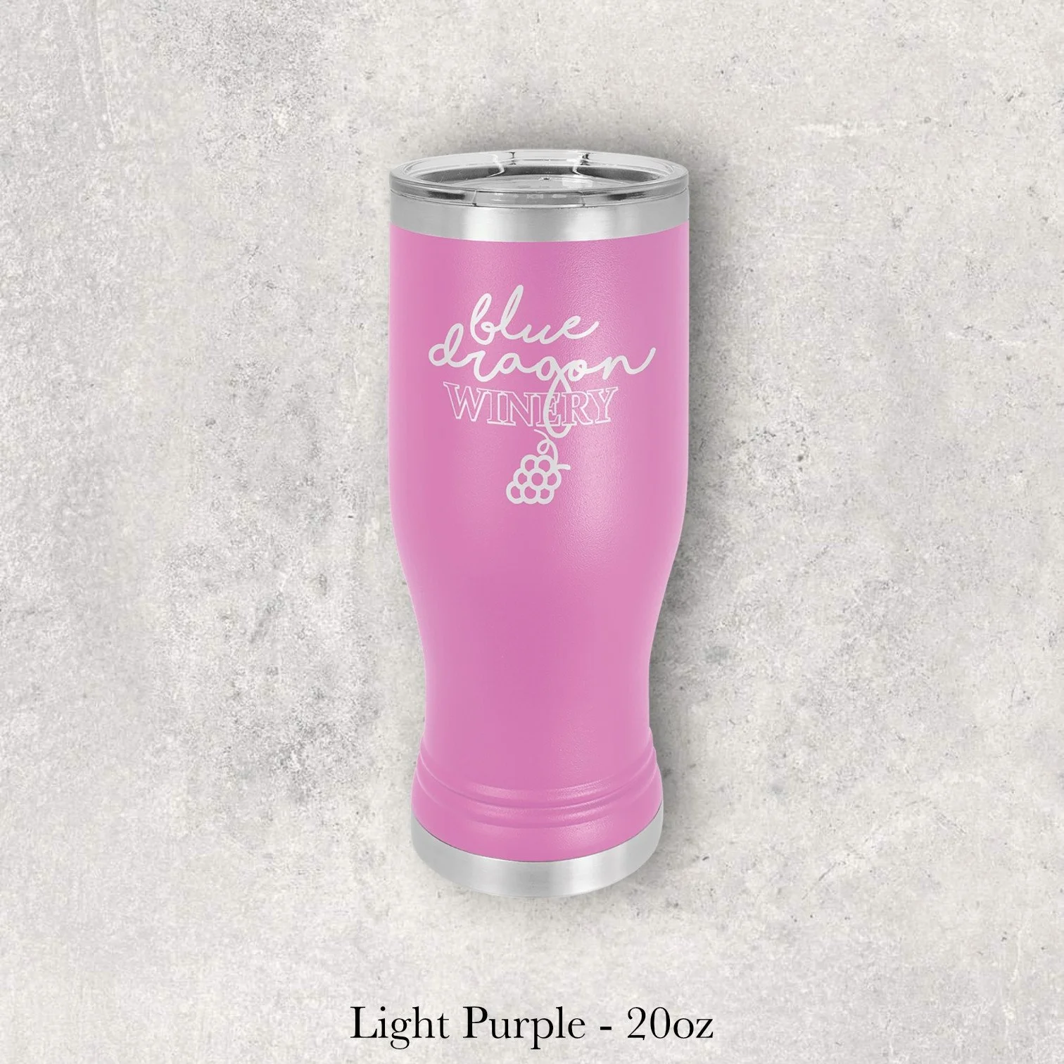 Light purple 20oz pilsner-style tumbler engraved by Lazeric with the Blue Lagoon Winery logo.
