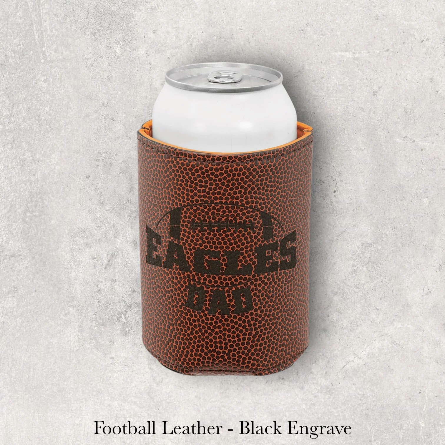 Laser engraved football-textured leather can coozie with Eagles football logo, engraved by Lazeric