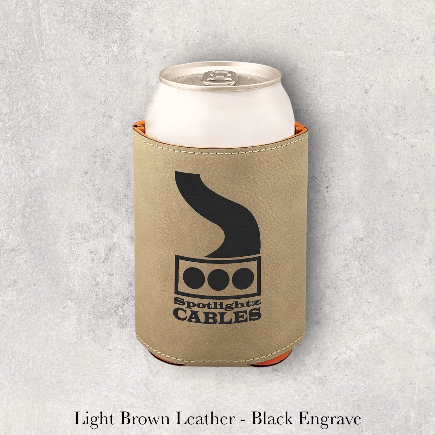Laser engraved light brown leather can coozie with Spotlight Cables logo, engraved by Lazeric