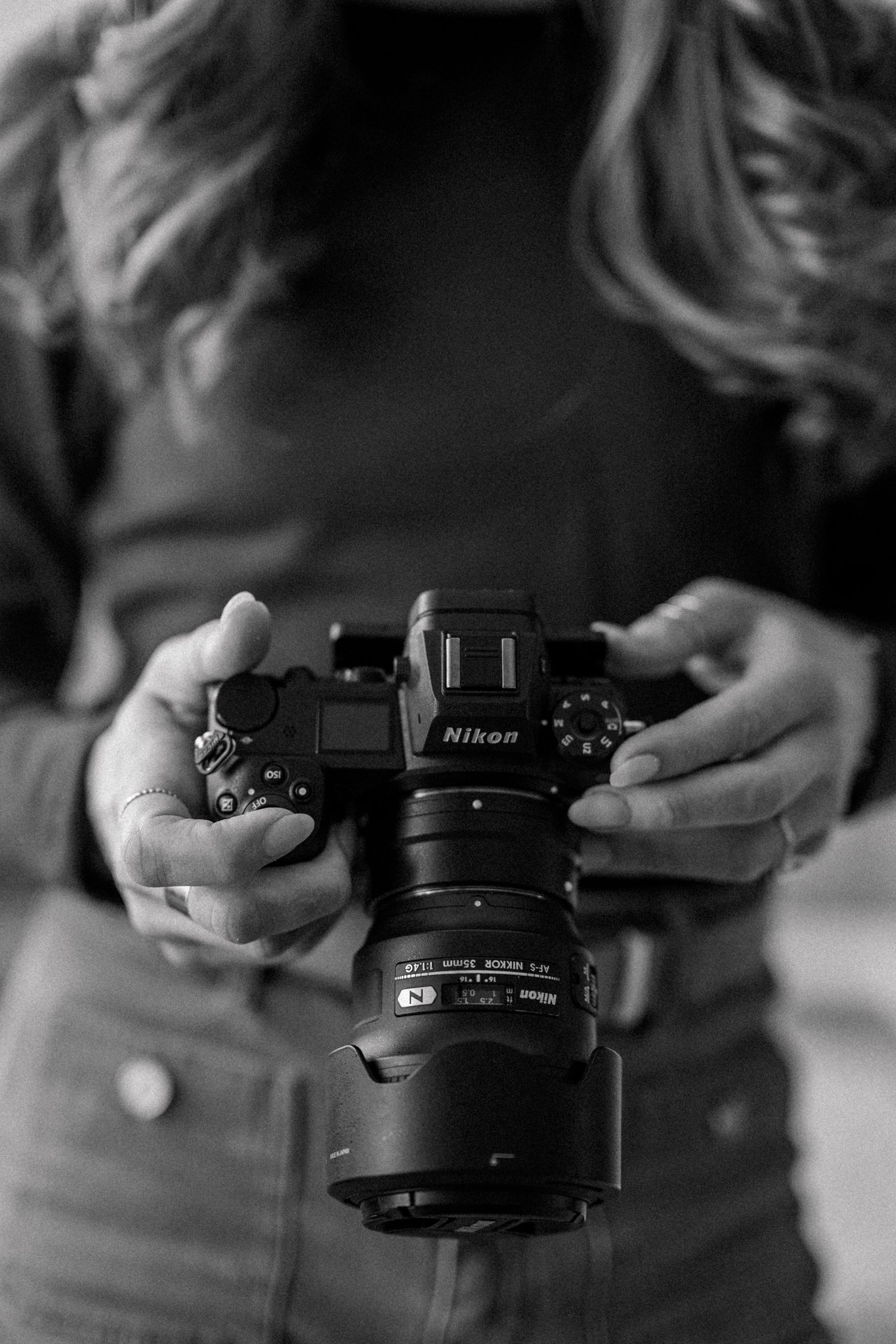 Close up of a camera in black and white for brand session, photographed by Claire Petersen Photography.