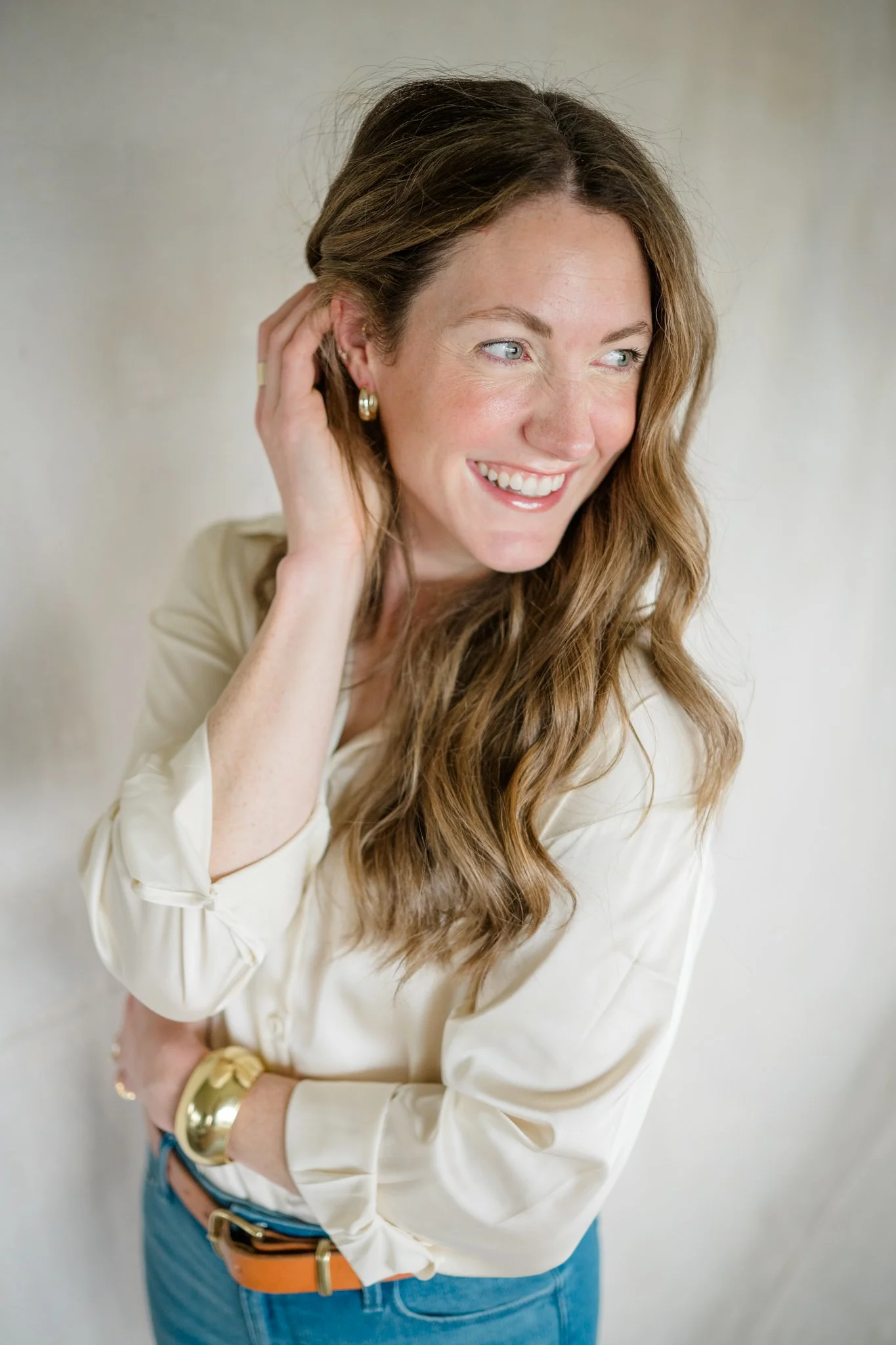 Headshot of Claire Petersen, owner of Claire Petersen Photography, college graduation photographer.