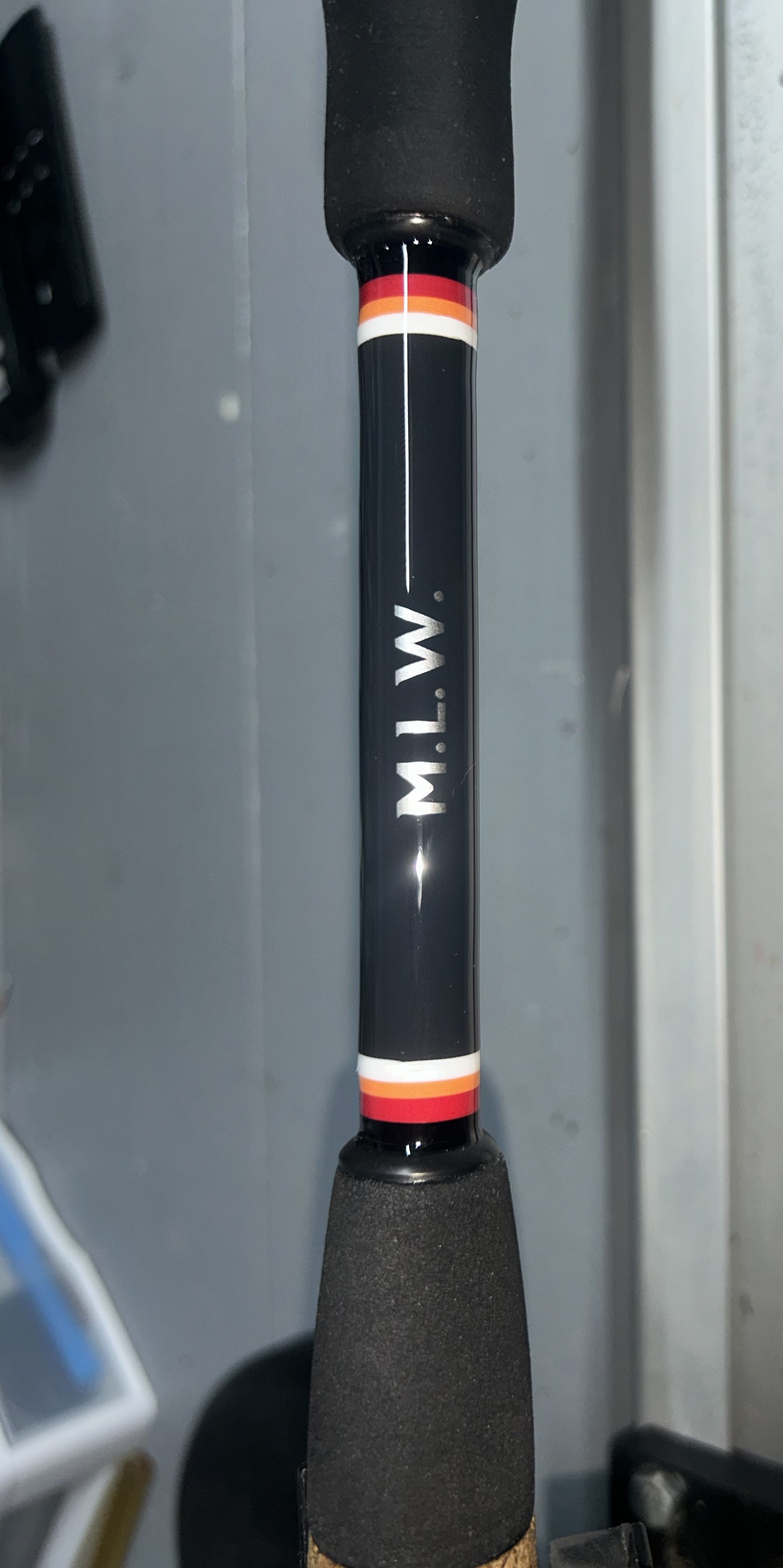 fishing rod handle with MLW logo