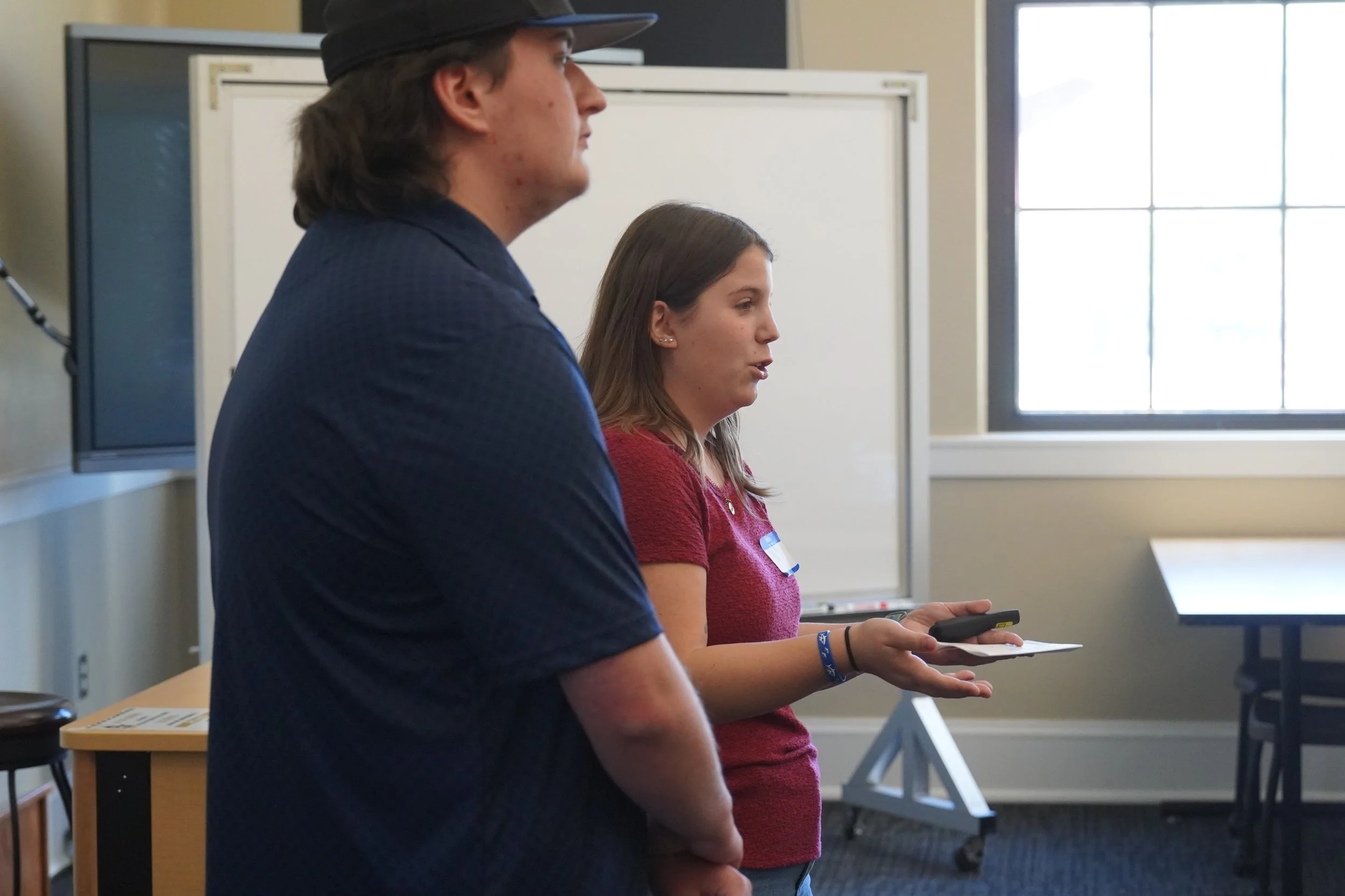 Left to right: EOU students Jacob Sanchez and Indy Gauthier pitch their ideas at the 2026 EO Innovation Jam listen to the teams pitch their ideas