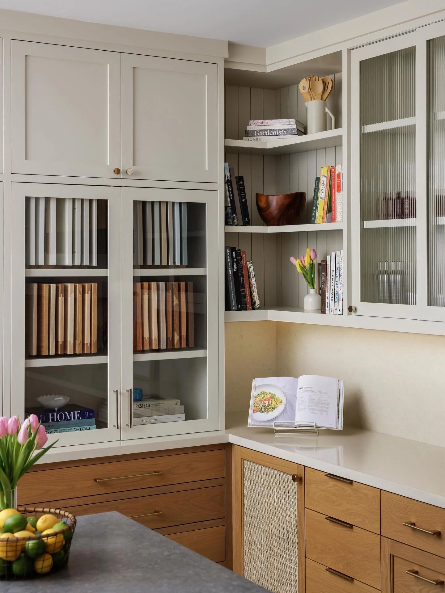 At @schmitzwoodworks new cabinet showroom, function and aesthetics merge to create the ideal space for both clients and employees. 

Warm wood tones, creamy and cool quartz work surfaces, and concrete floors create a visually balanced color palette, 