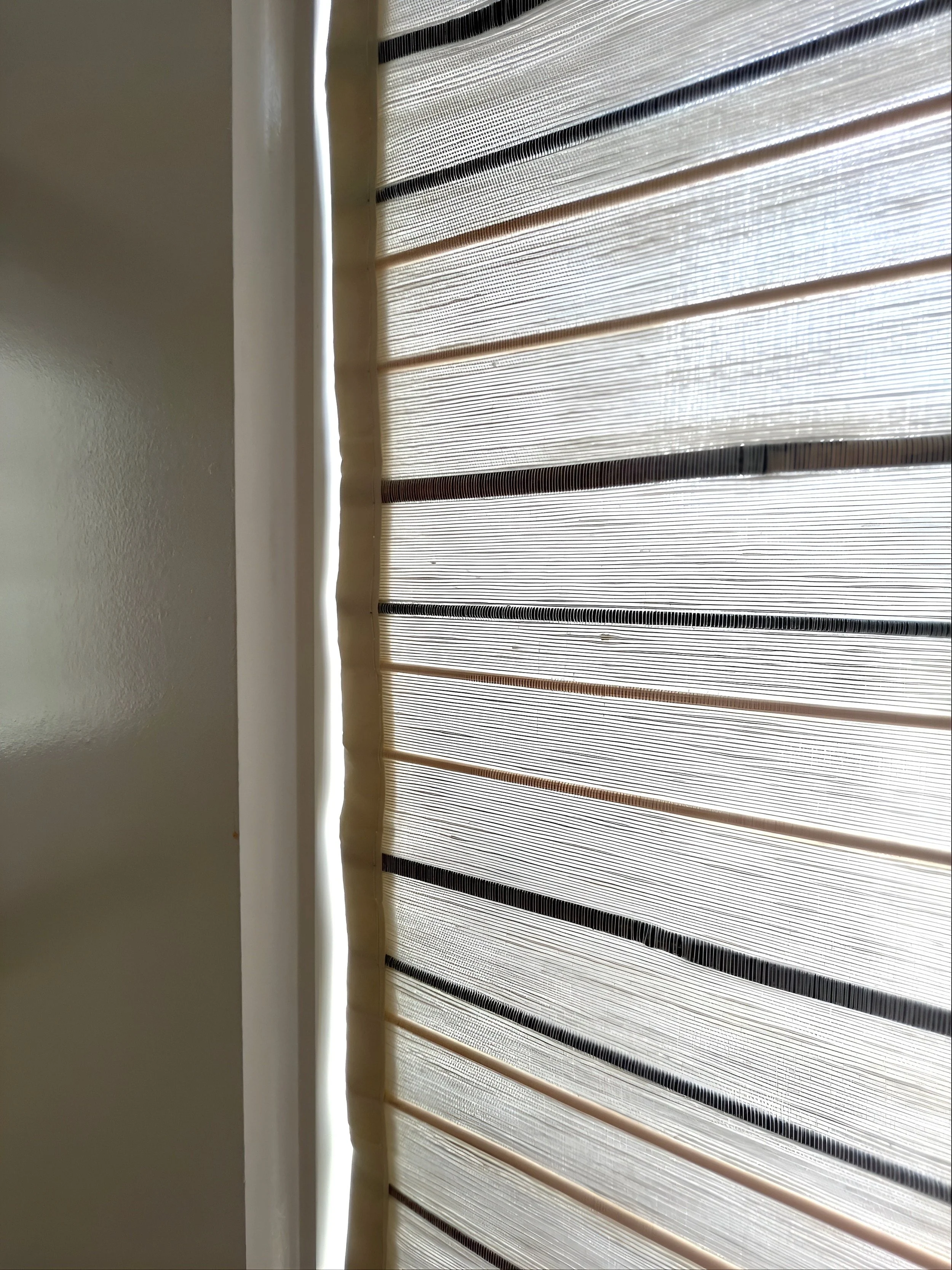 custom natural roman shades for dining room in Davidson, NC home