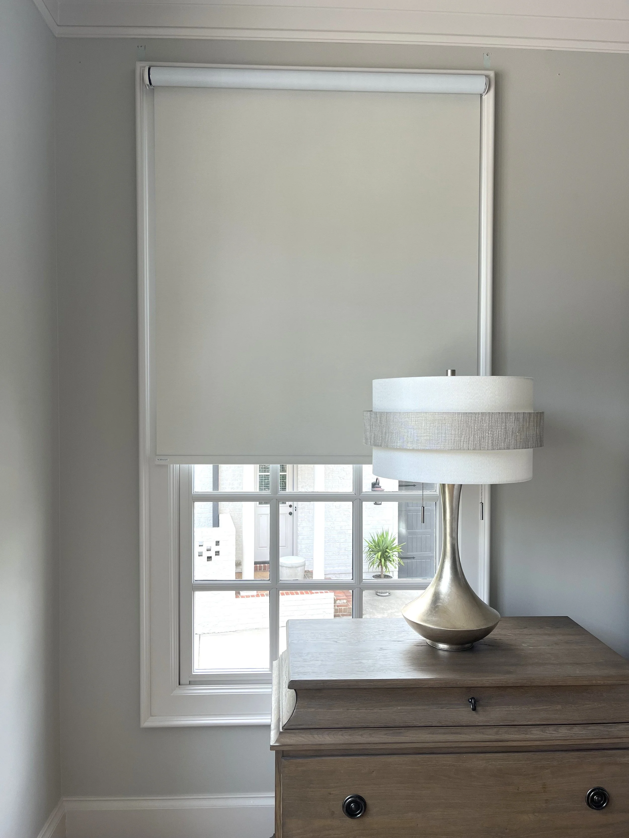 custom room darkening motorized roller shades for master bedroom in Charlotte NC home