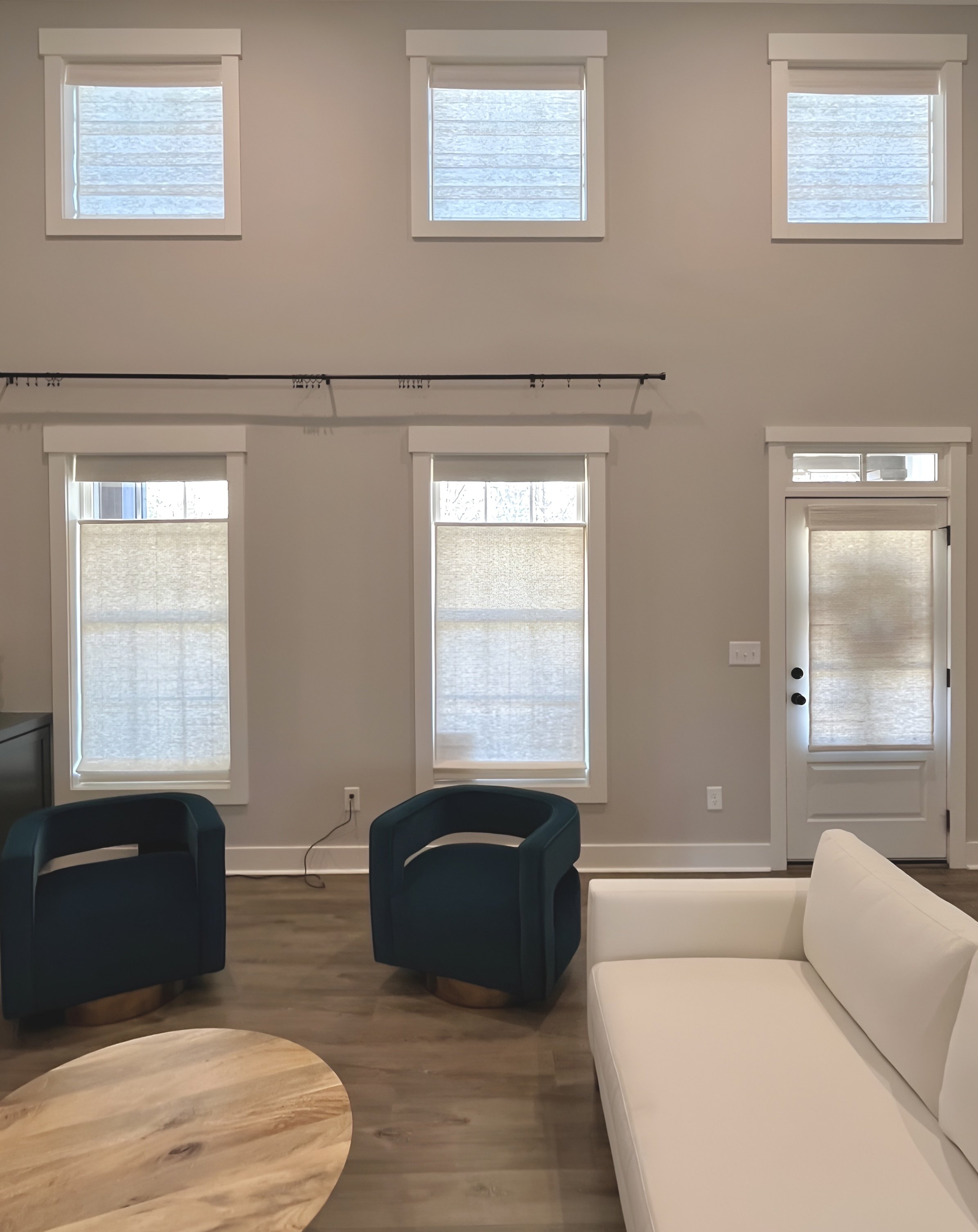 custom top down bottom motorized natural roman shades for living room in Lake Wylie, NC home