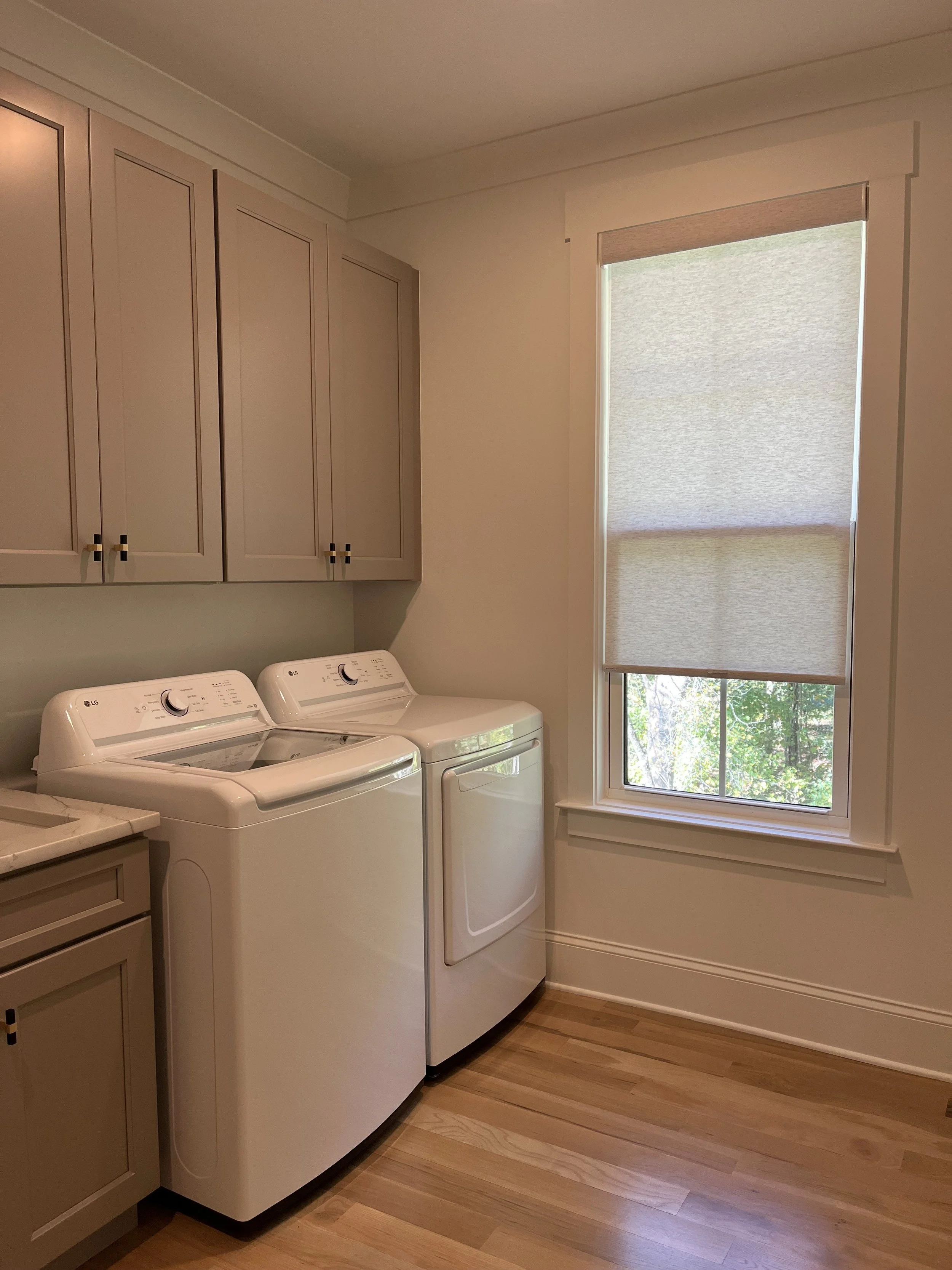 custom light filtering roller shades for laundry room in Charlotte, NC home