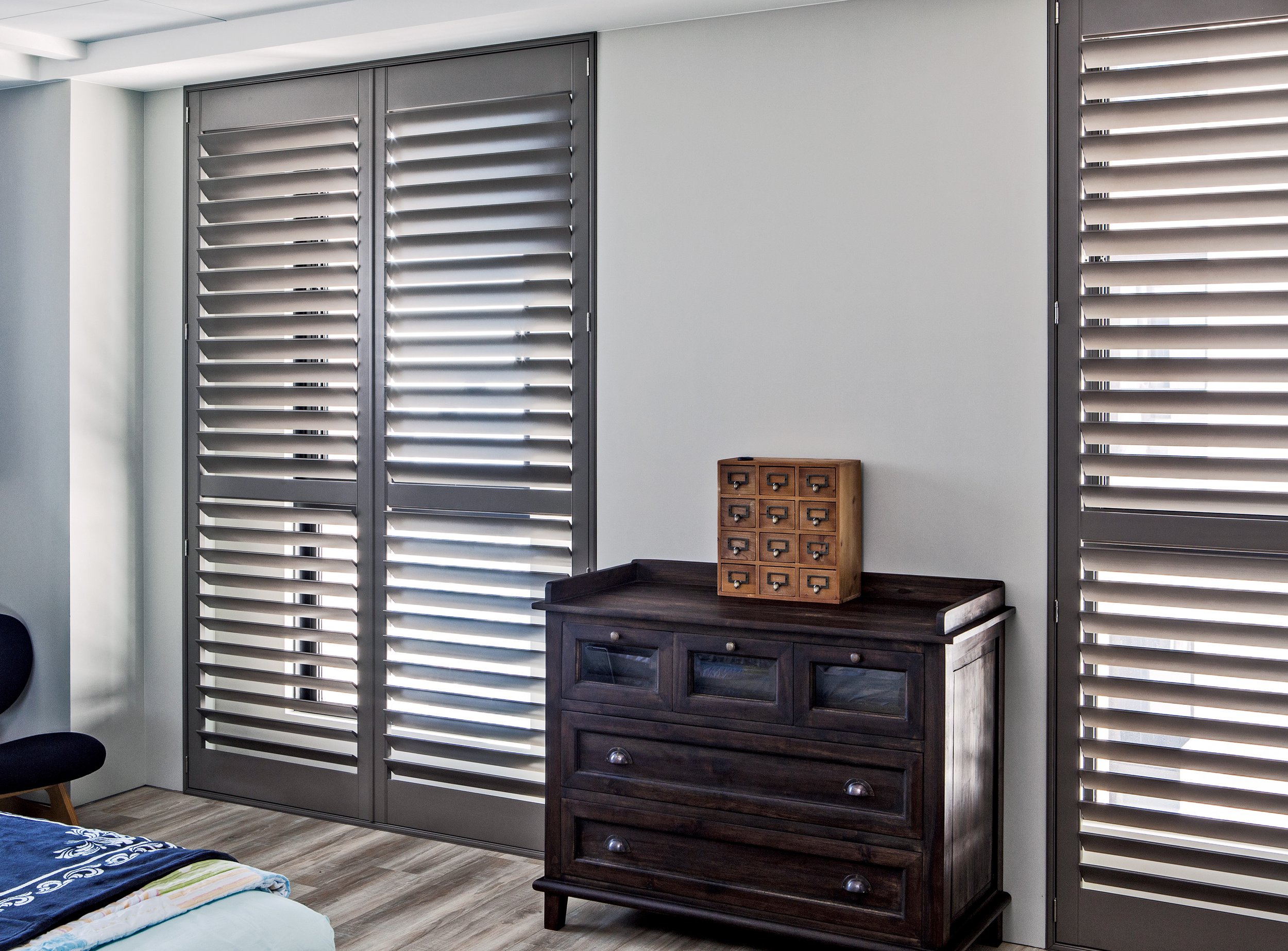 Plantation shutters in Charlotte NC bedroom