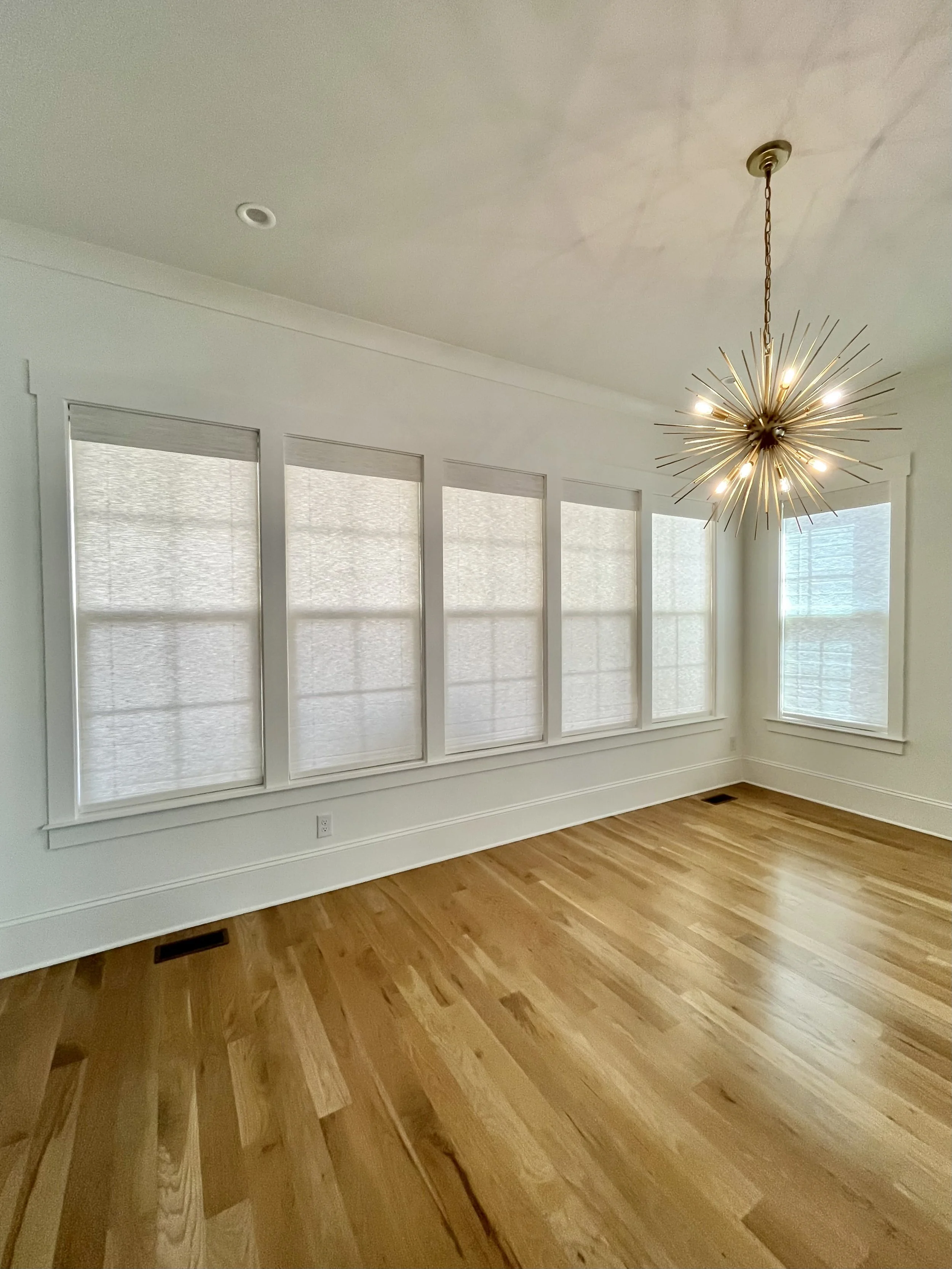 custom top down bottom up roman shades for formal dining room in Charlotte, NC home