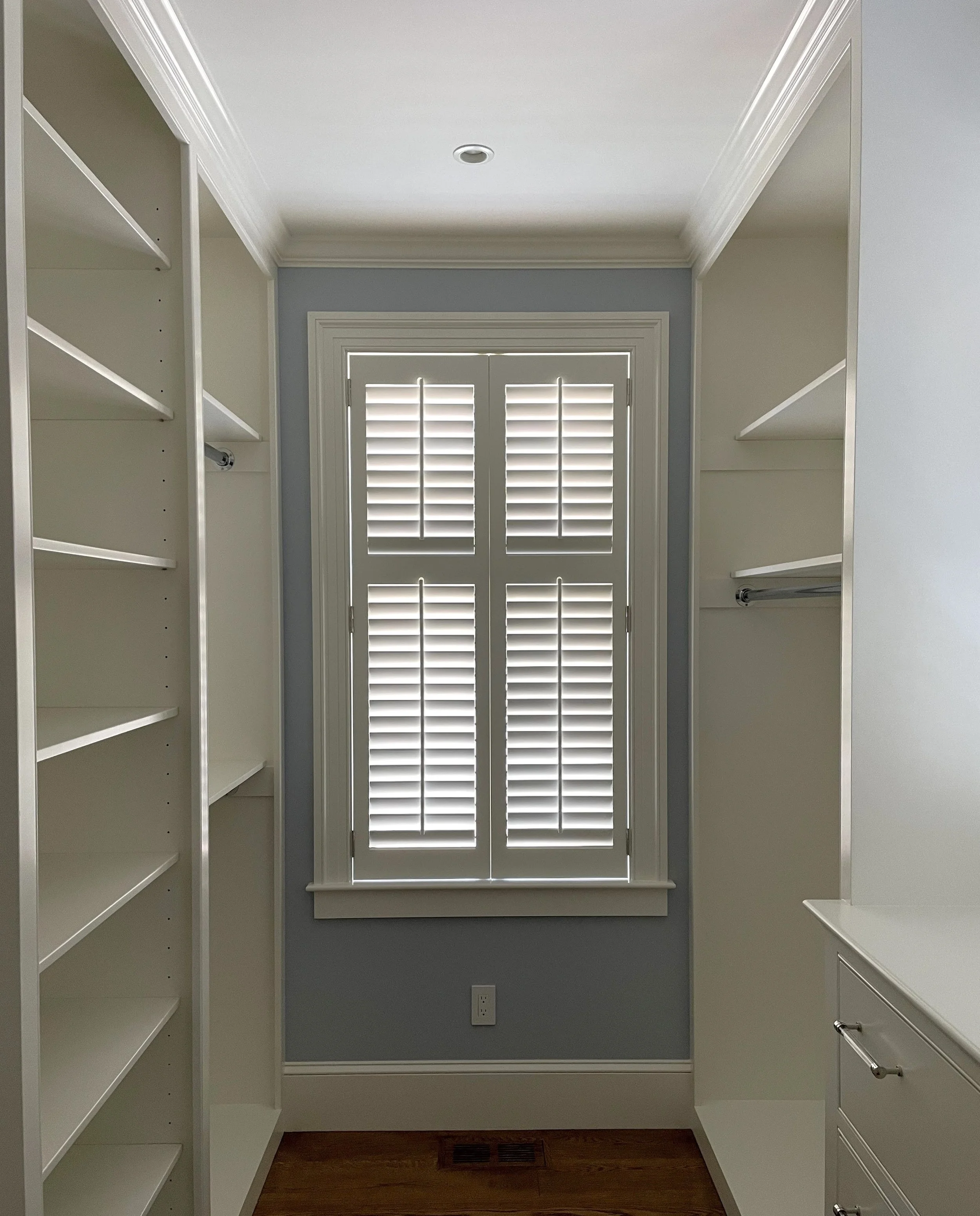 custom hardwood plantation shutters for custom master bedroom closet in Charlotte, NC home
