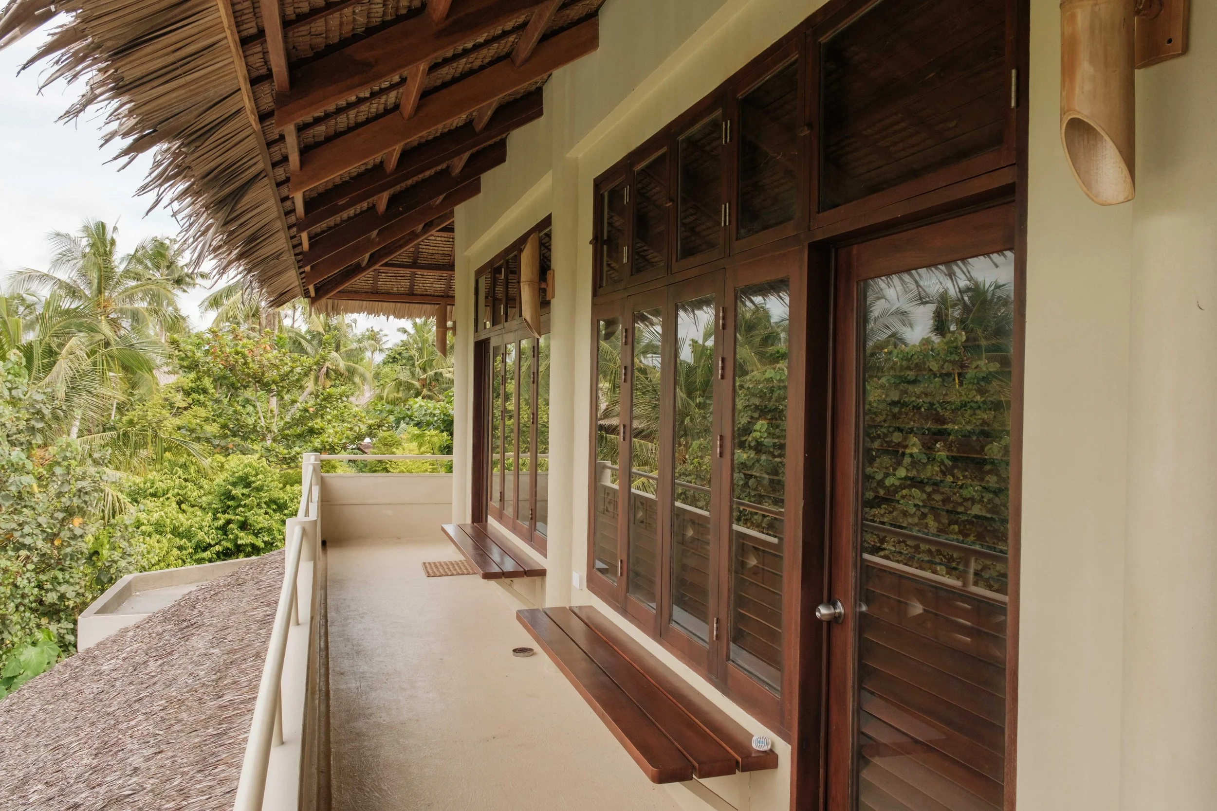 schoenhouse-villa-siargao-couple-suite-balcony-walkway.jpg
