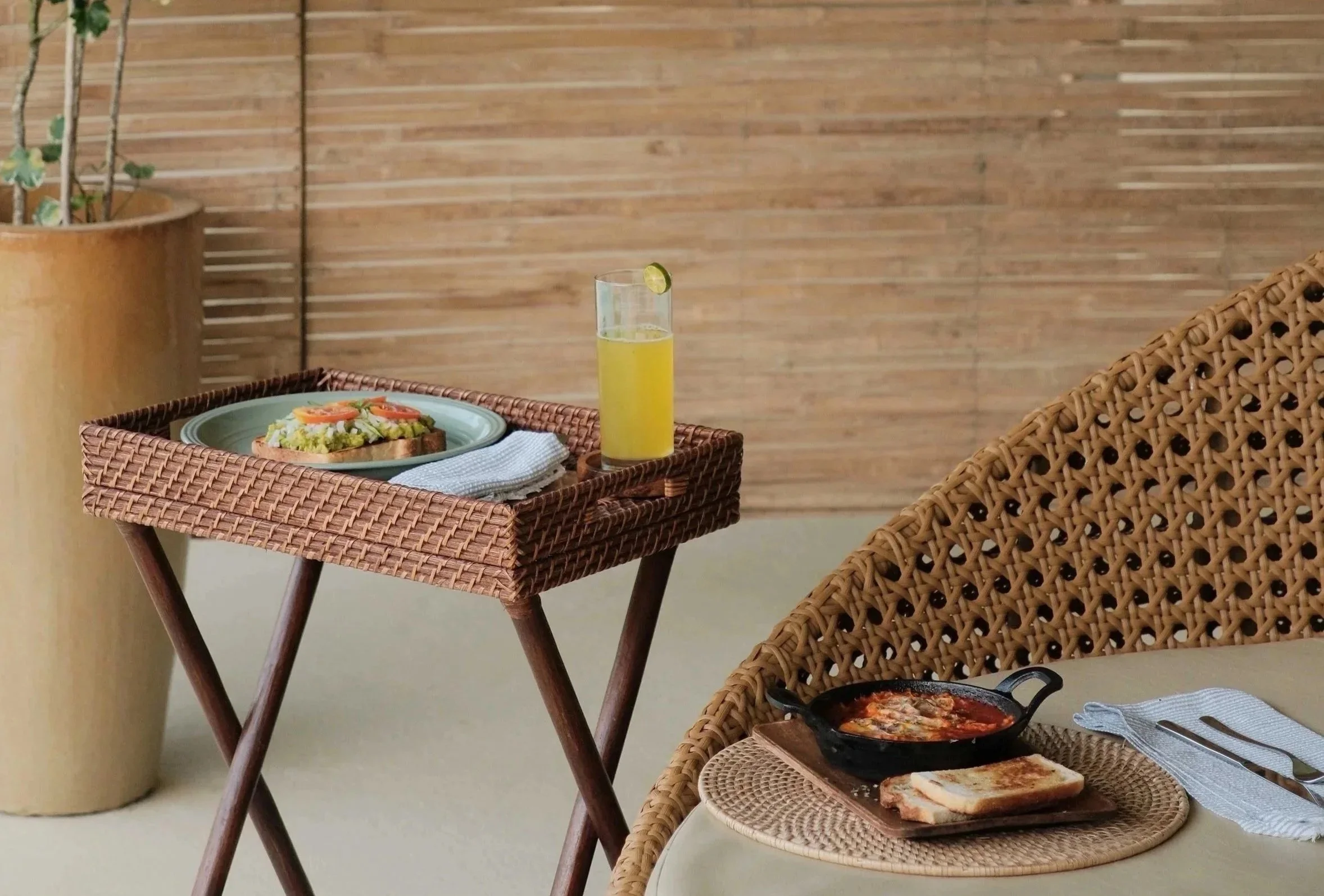 Poolside breakfast at schönhouse Villa Siargao served beside the large swimming pool in General Luna, with tropical design and relaxed boutique villa atmosphere.