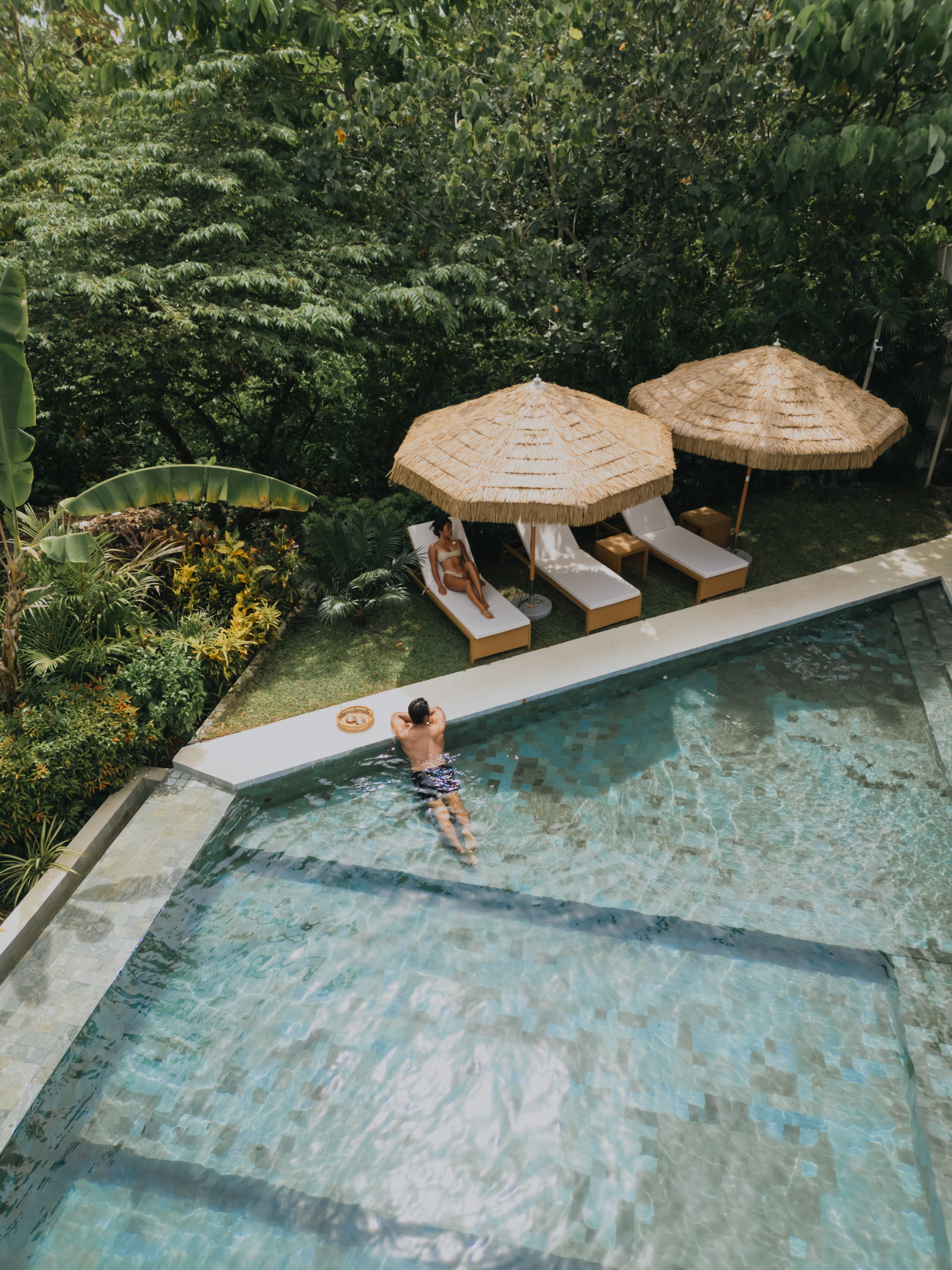 schoenhouse villa infinity pool with sun loungers siargao island general luna