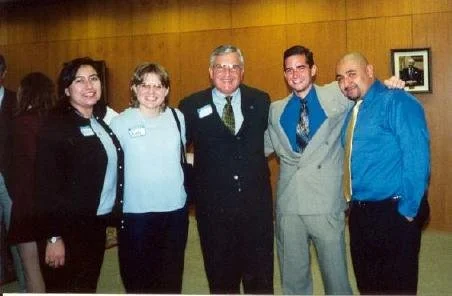 Dr. Rex Ball, Shane Foley, and Robert Mendiola with guests.