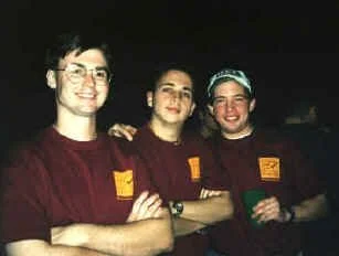 Associate Members Ryan "Dallas" Sensiba and Keith Krobot with dates at an AM ceremony dinner.