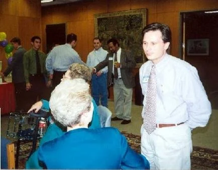 Brother Todd "Cubby" White, High Pi (Alumni Advisor), talking with Mrs. Ball.