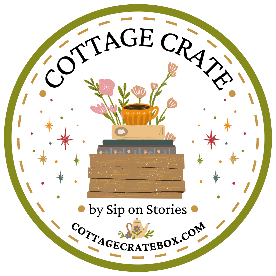 Illustration of a cozy scene featuring a wooden crate holding a stack of books with a cup of coffee on top, surrounded by colorful flowers and greenery. The words 'Cottage Crate by Sip on Stories' and CottageCrateBox.com are also written.
