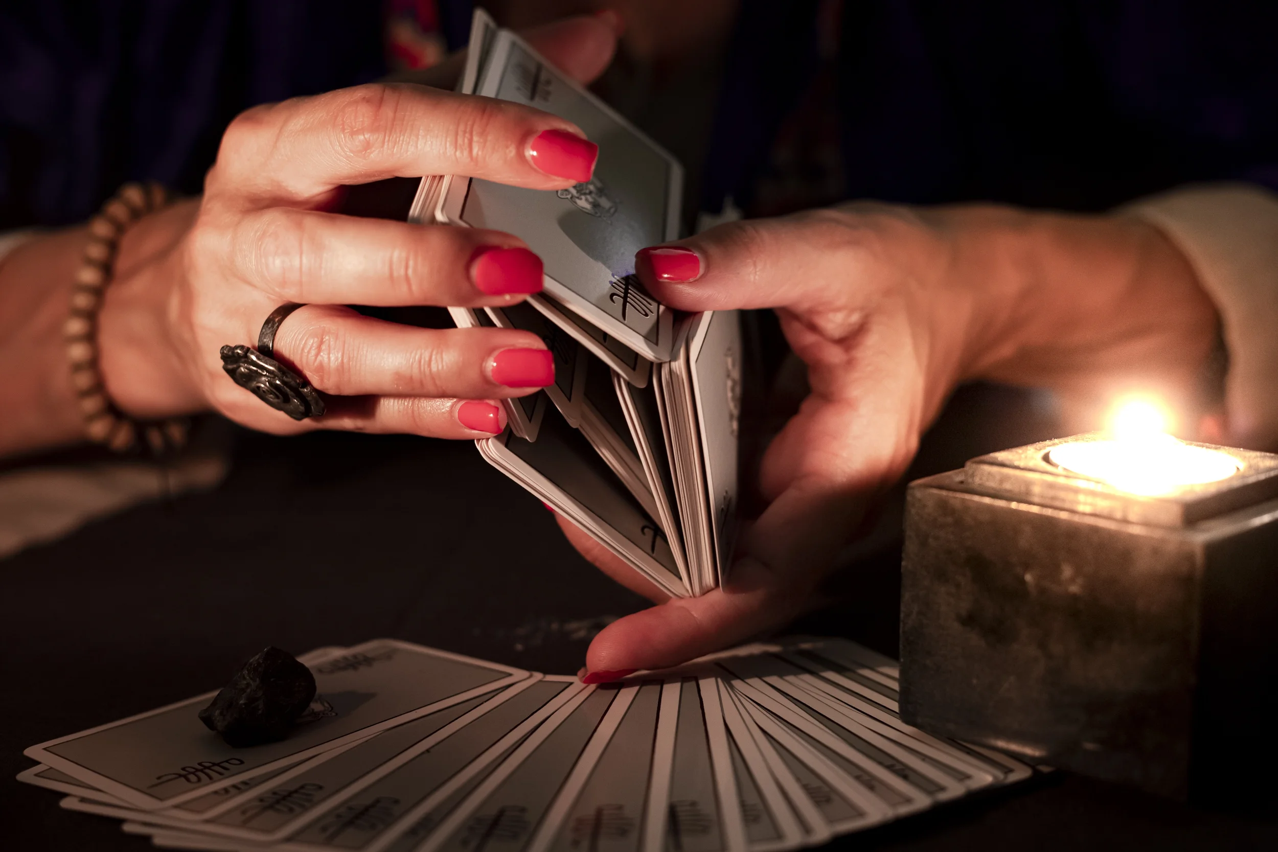 VistaCreate-604020304-stock-photo-fortune-teller-female-hands-shuffling-deck-tarot-cards-reading-close.webp