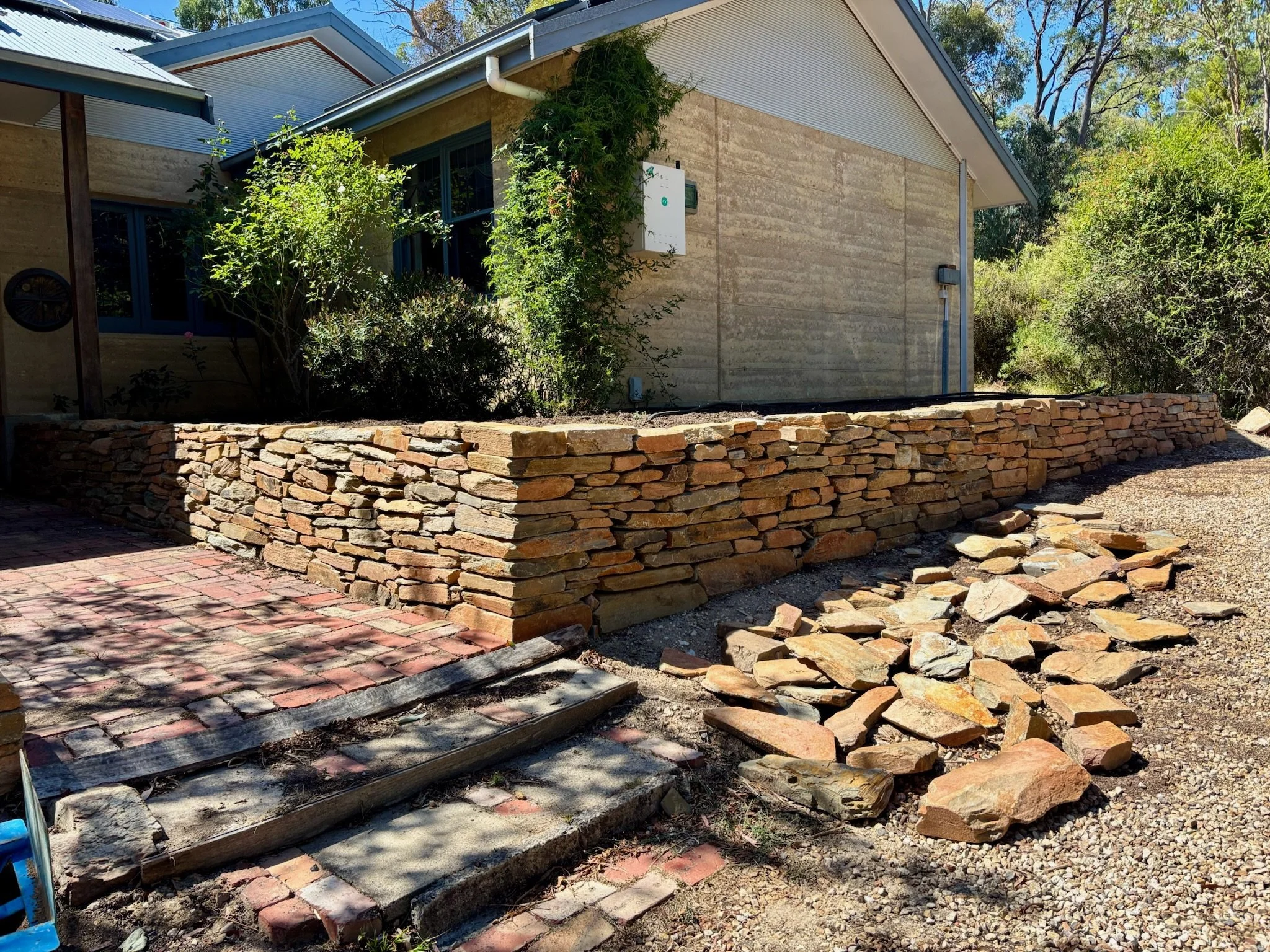 The amazing artistry of Jeremy's drystone wall. The pressure was on for Venetia to live up to his contribution and ensure the planting design was just as powerful.