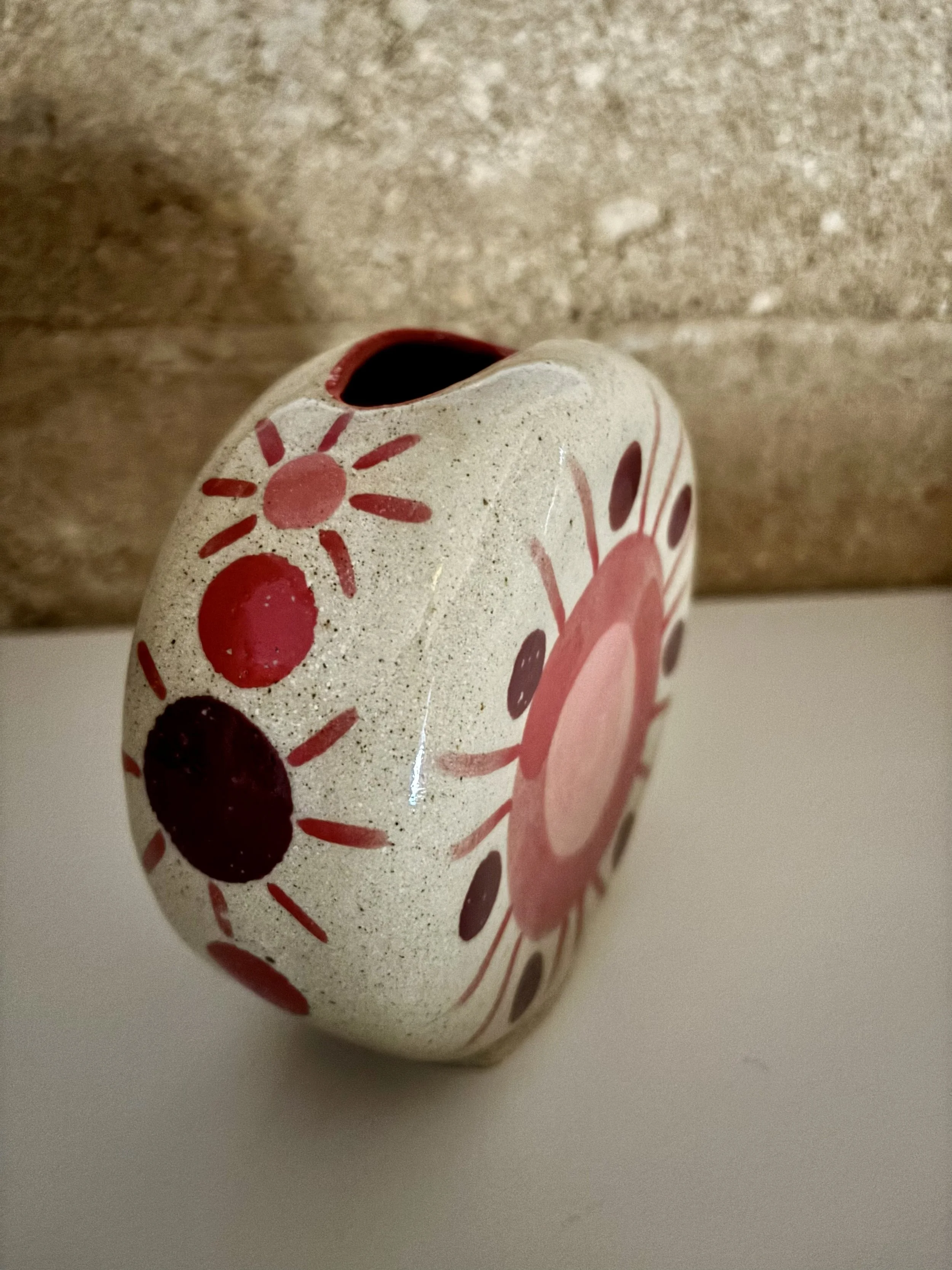 Disc vase in earthy red.jpg