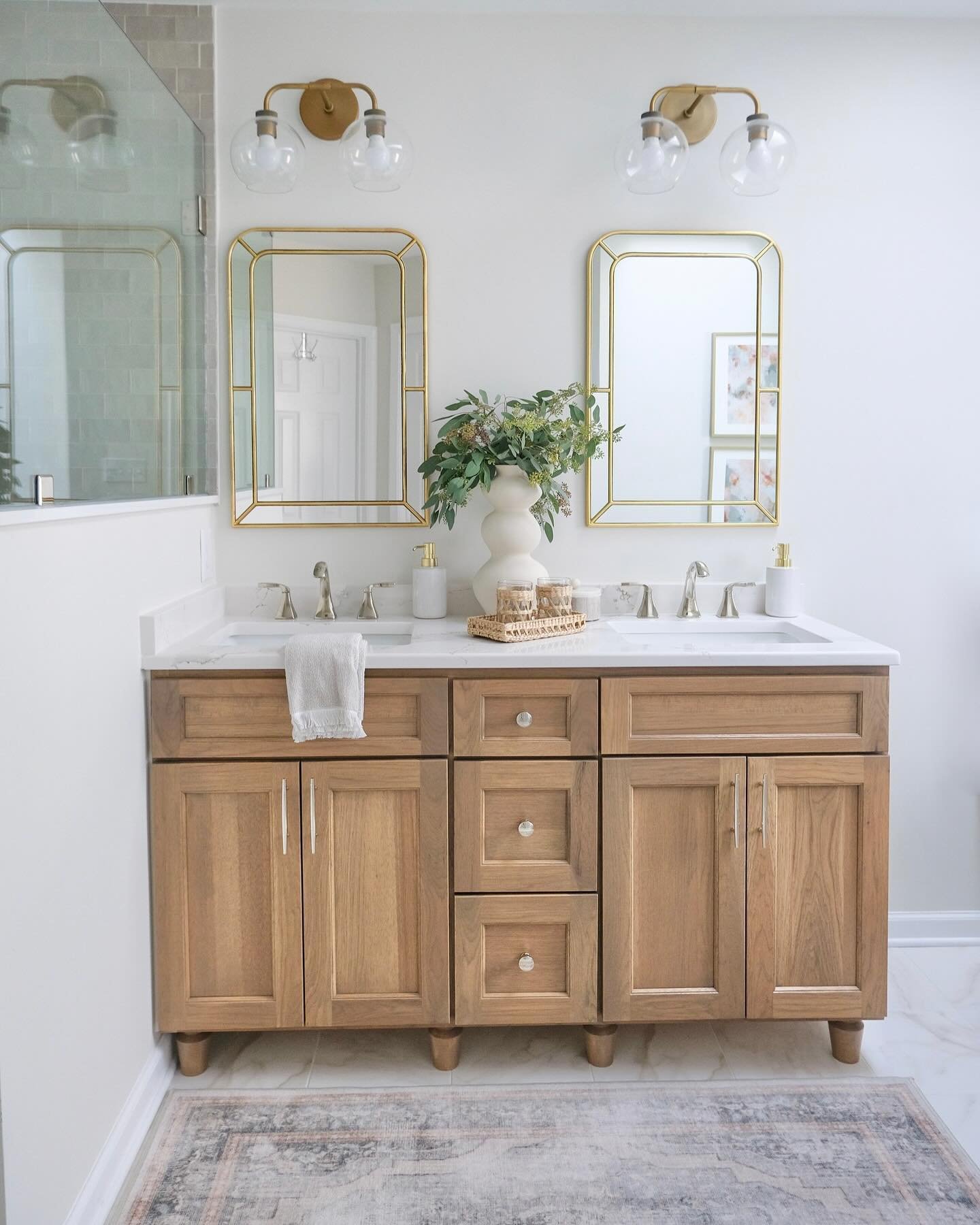 This is one of my favorite bathroom projects to date. What an amazing transformation! We took this primary bathroom from dark and outdated to bright and beautiful. It is truly an oasis. Swipe through to see the before photos. Photo credit: @natbirdph