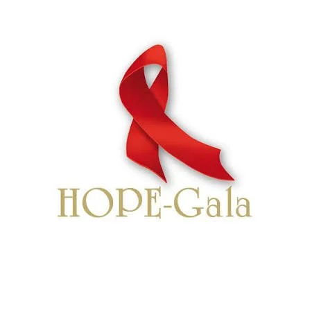 Rotes Band in Form einer Schleife über dem Text 'HOPE-Gala' auf weißem Hintergrund.