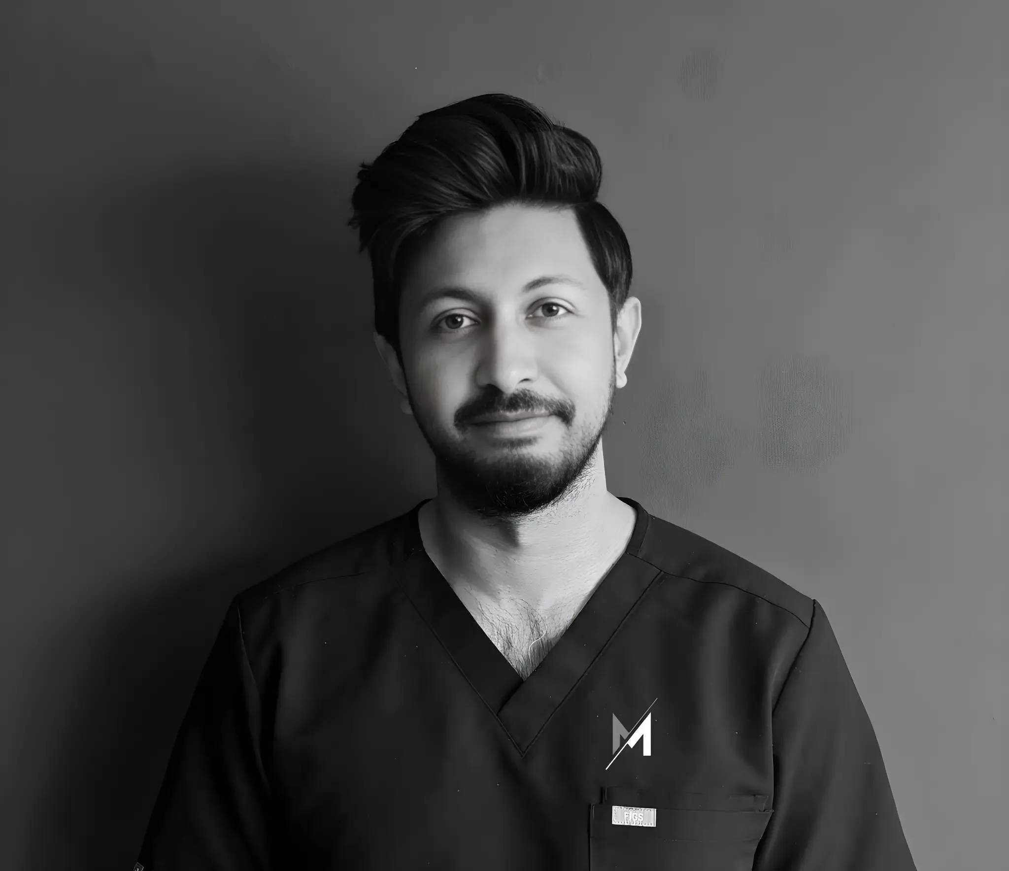 Dr Mukil Menon headshot