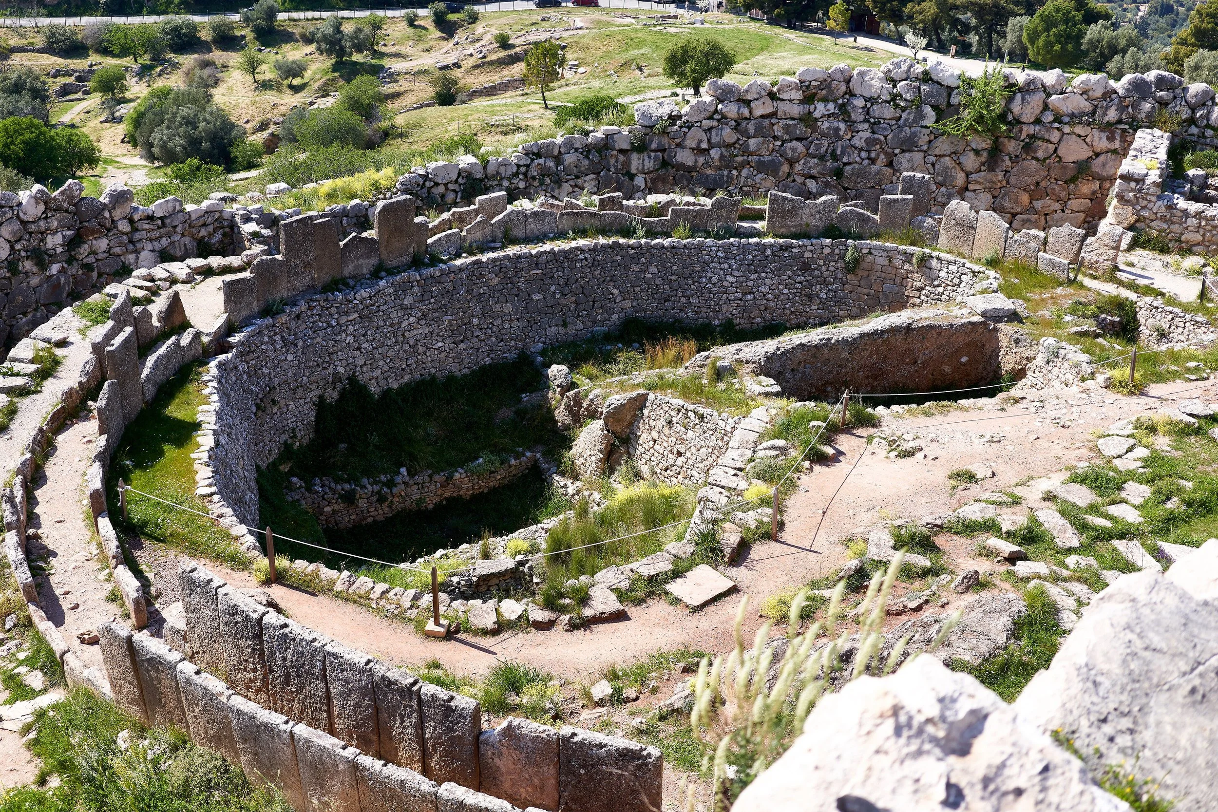 The_Grave_Circle_A_(16th_cent._B.C.)_in_the_citadel_of_Mycenae_on_26_March_2019.jpg