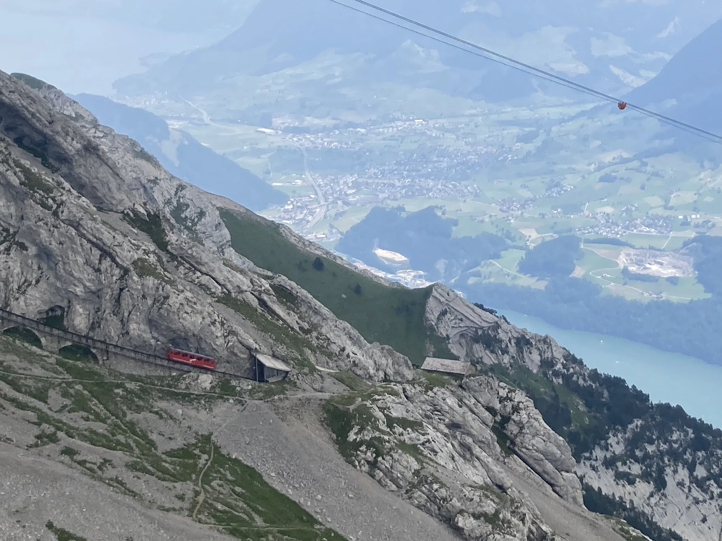 Cog_railway_on_Mount_Pilatus_with_town_in_background.jpg