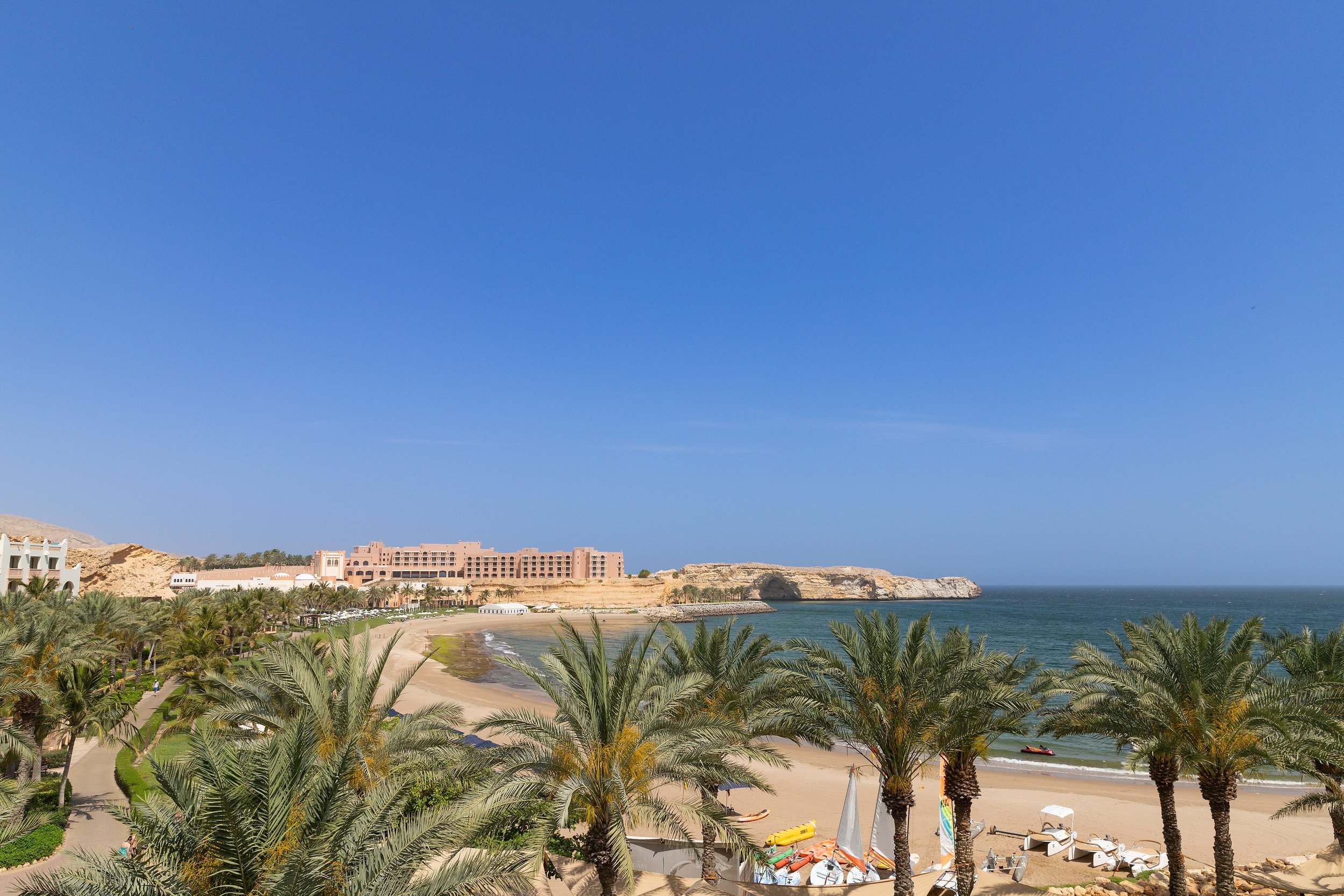 Aerial_view_of_Turtle_Beach_in_Bandar_Jissah,_Oman_(53696857787).jpg