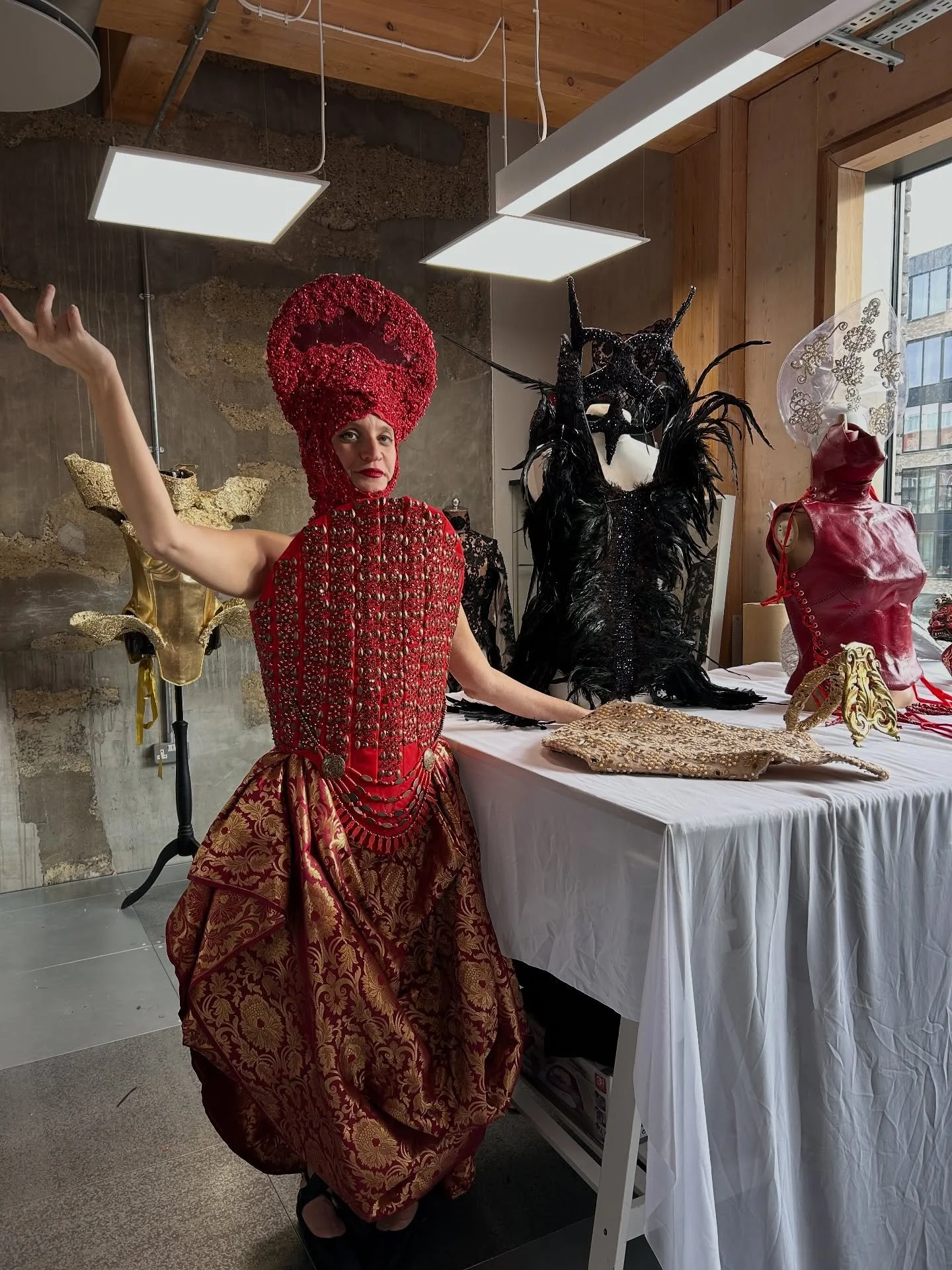 Our Tuesday tour yesterday led us to the studio of the fabulous costume designer and performer, @sybansyban.
She greeted us in one of her resplendent red, papal-inspired creations that gleamed in the sunlight streaming through her beautiful studio.
