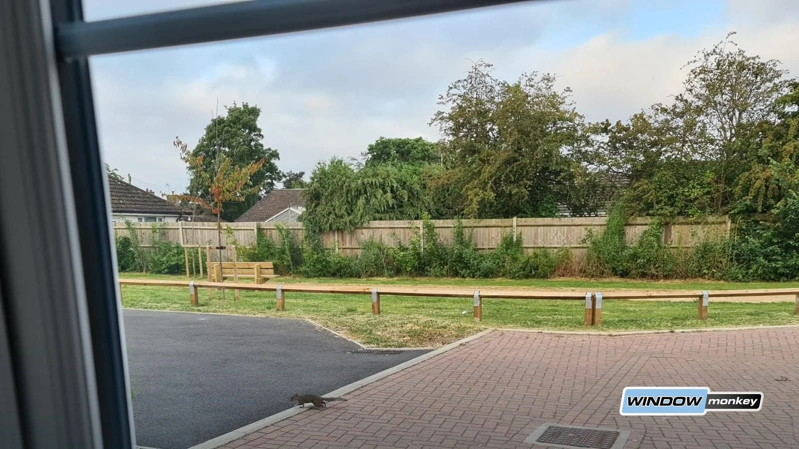 Closed bedroom window facing a road, illustrating a traffic-noise glazing enquiry