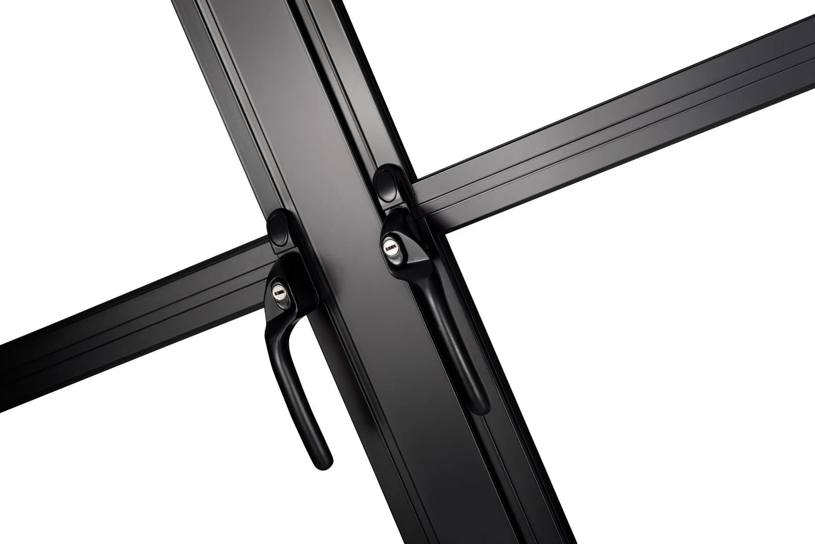 Close-up of black aluminium window frame with a lock and handle mechanism.