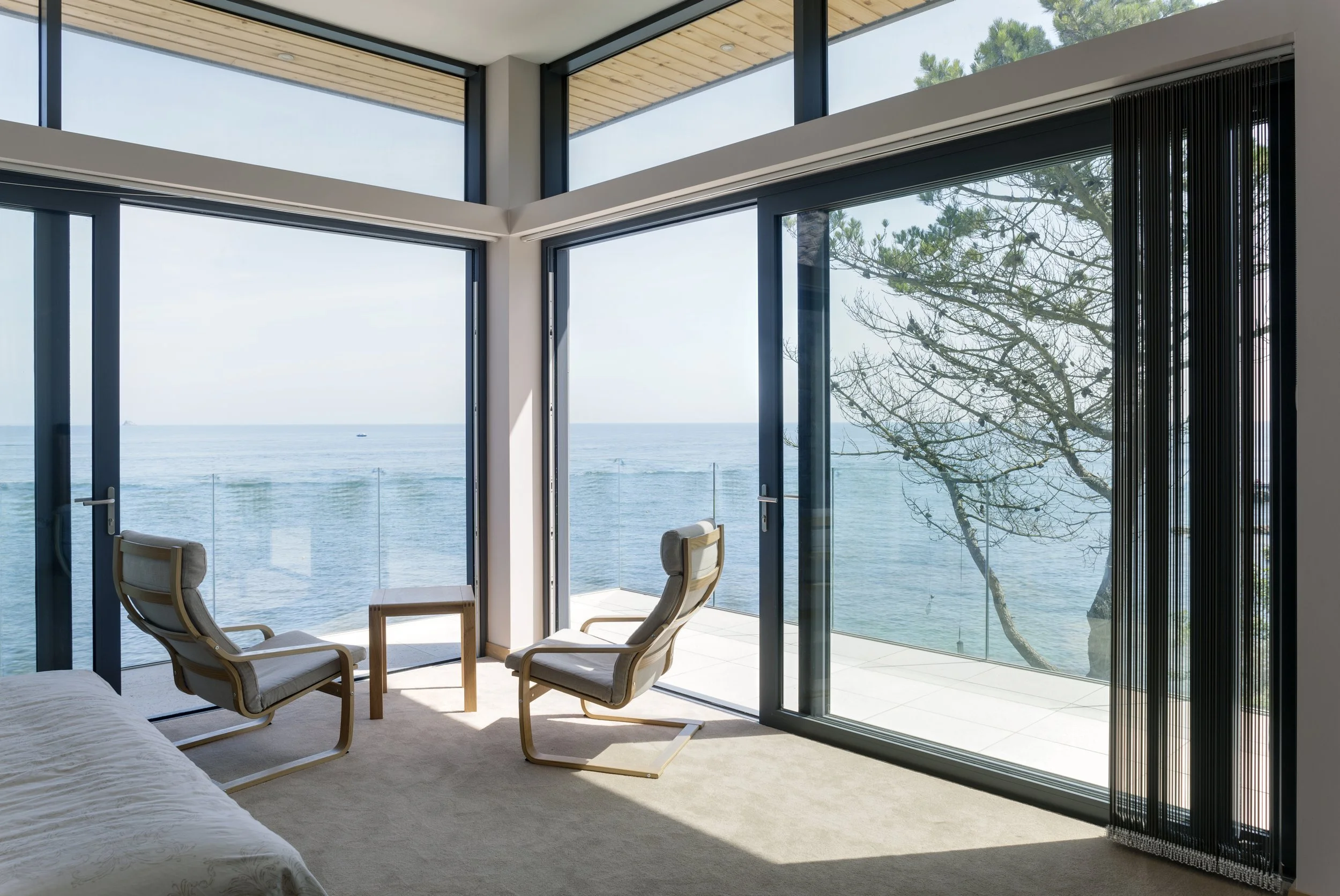 Sliding patio door with panels overlapping to reveal the everyday access opening