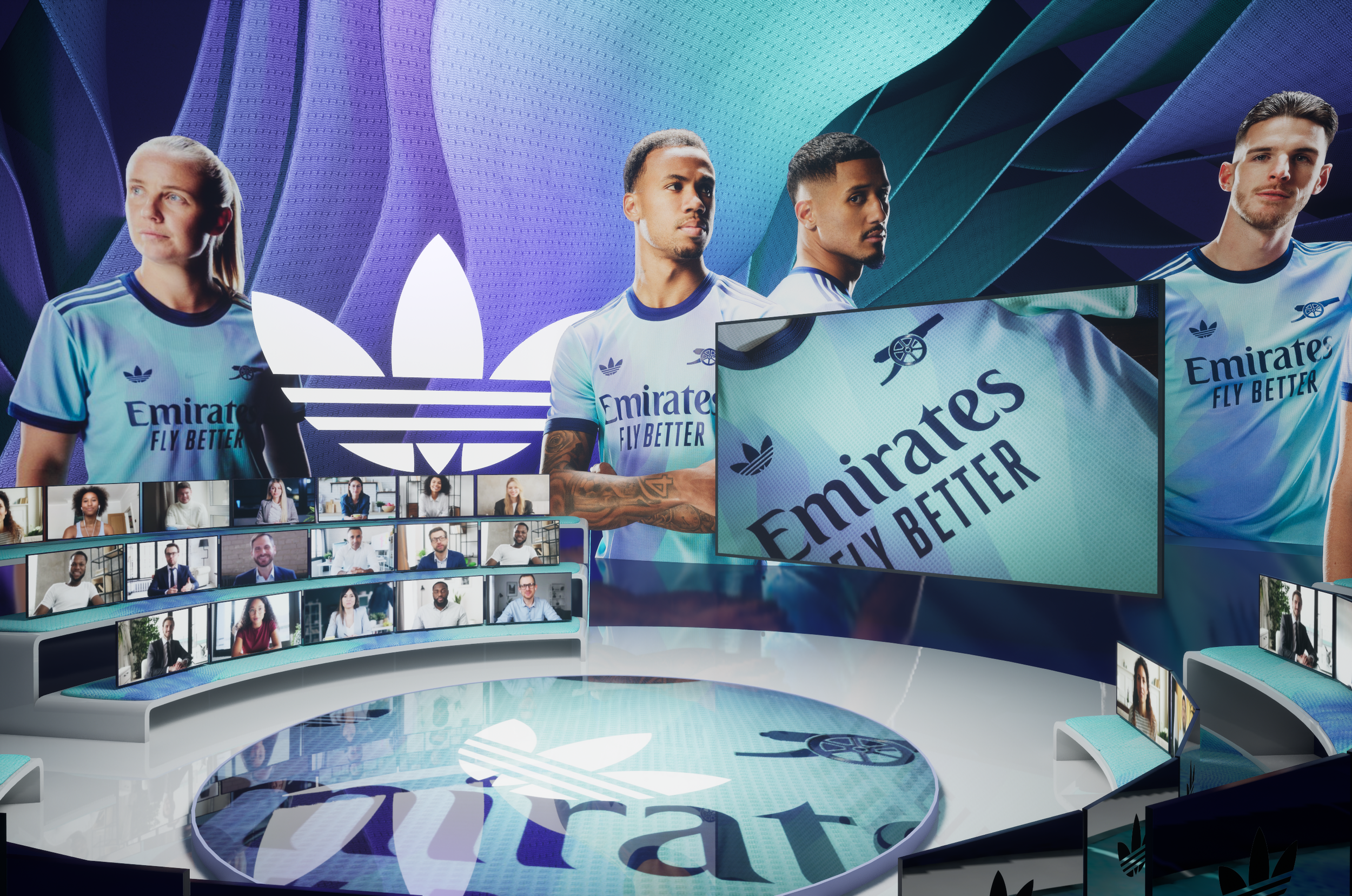 A virtual conference stage featuring oversized screens displaying athletes in blue París Saint-Germain soccer jerseys, with a large Adidas logo in the background and a semi-circle of small video call windows with various people. The stage has the Emirates logo and the phrase "Fly Better" on the floor and screens.