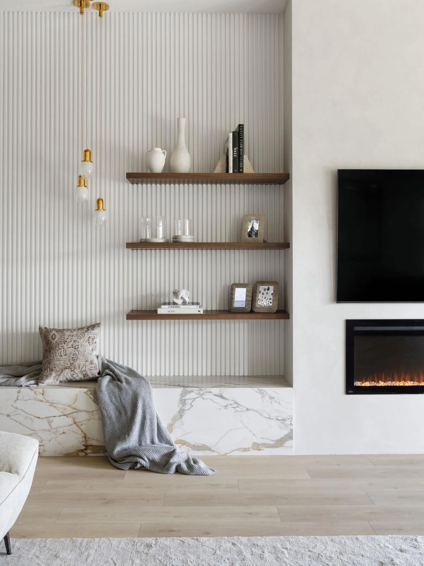 After ➡️ During ➡️ Before 

We leaned into clean lines, plaster, and a refined palette to create a fireplace that feels both grounded and elevated.

#InteriorDesigner #CoastalLiving #PalmBeachGardens #HomeDesign #LivingRoom