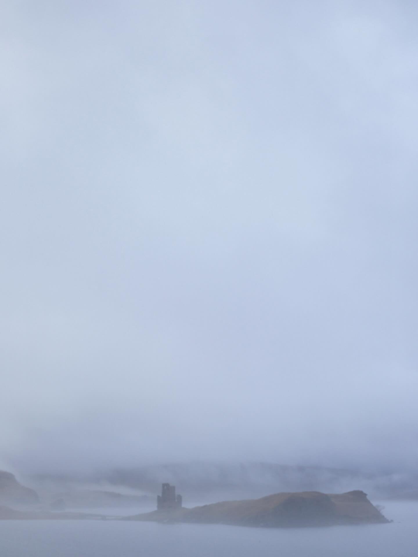 Winding our way back from Oldshoremore beach on the northwest coast we were flabbergasted as we drove around a craggy boulder &amp; saw this.. Ardvreck Castle. A 5th-century ruined tower house floating in cloud on the shores of Loch Assynt in Sutherl