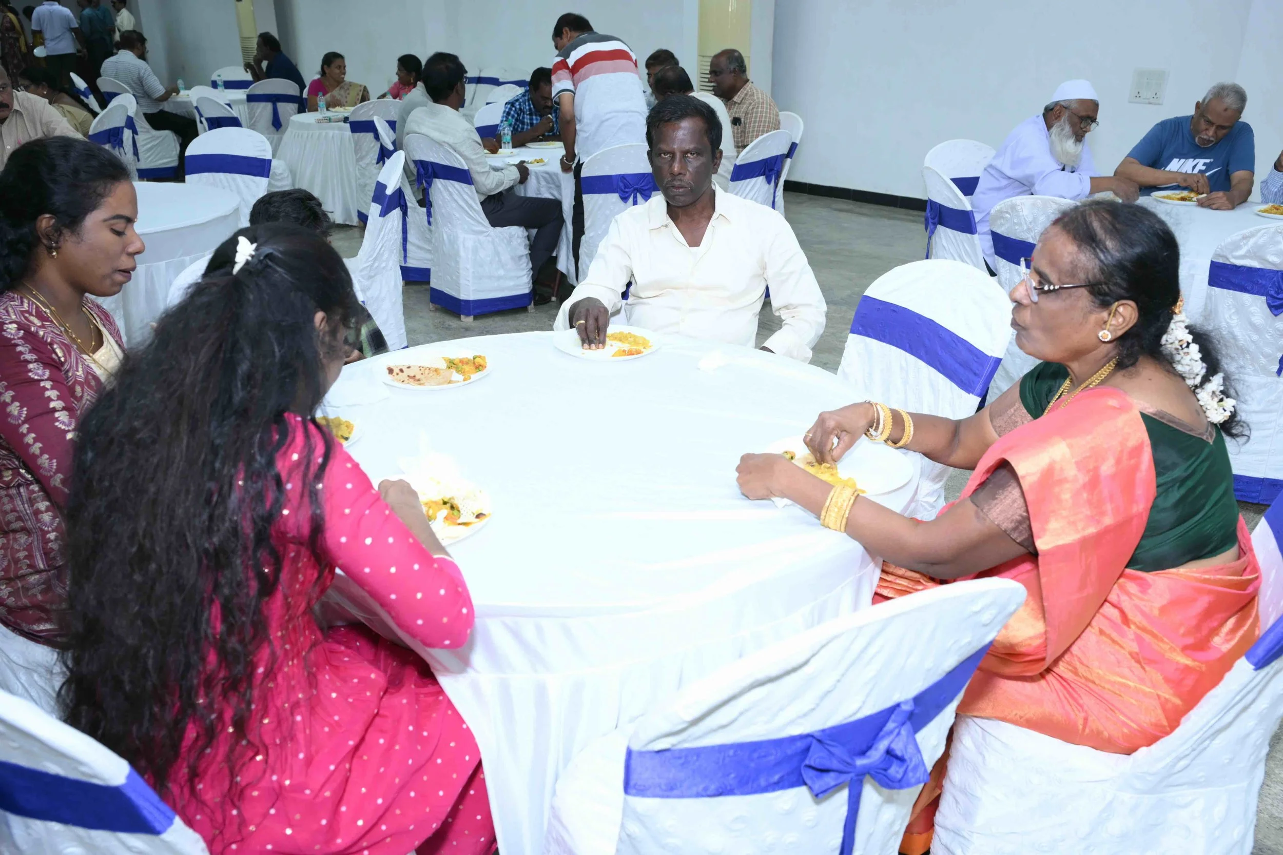 Selvapackiyam's family is tasting it. (Her husband Murugesan, daughters Anitha, Sharaniya and grandson Aadith Abhinav)