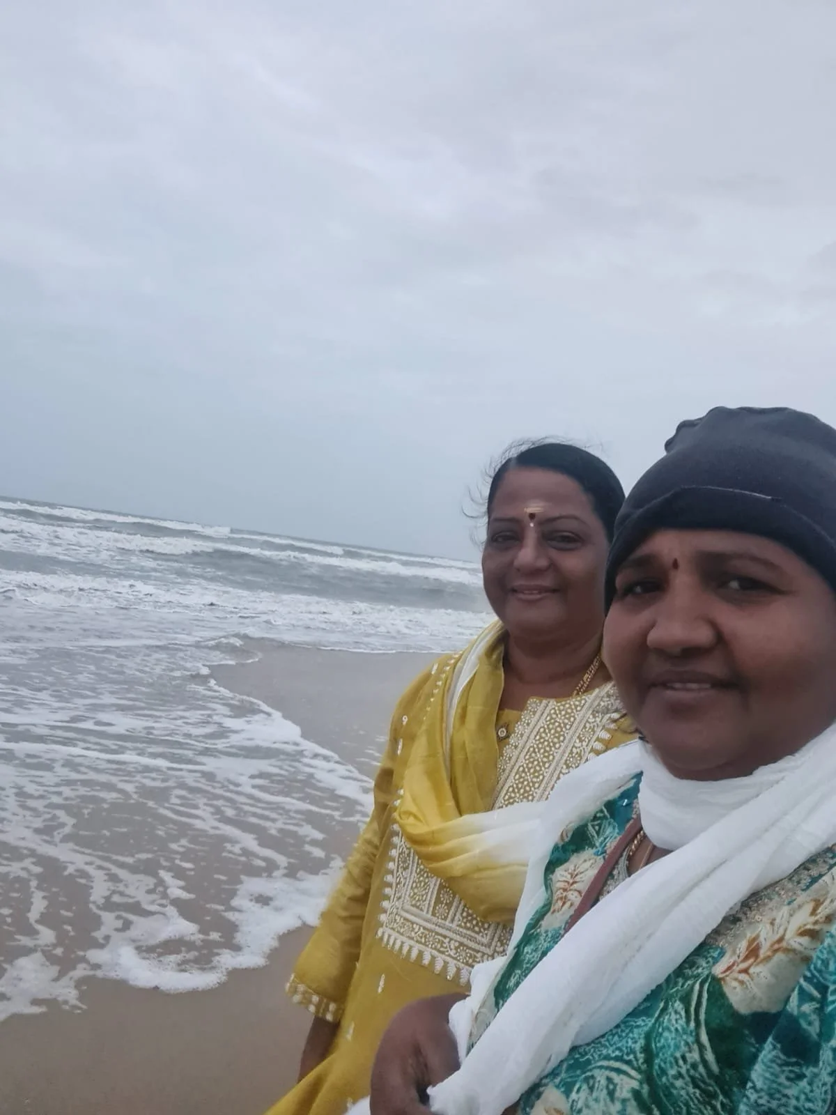 Bosom buddies at the beach.